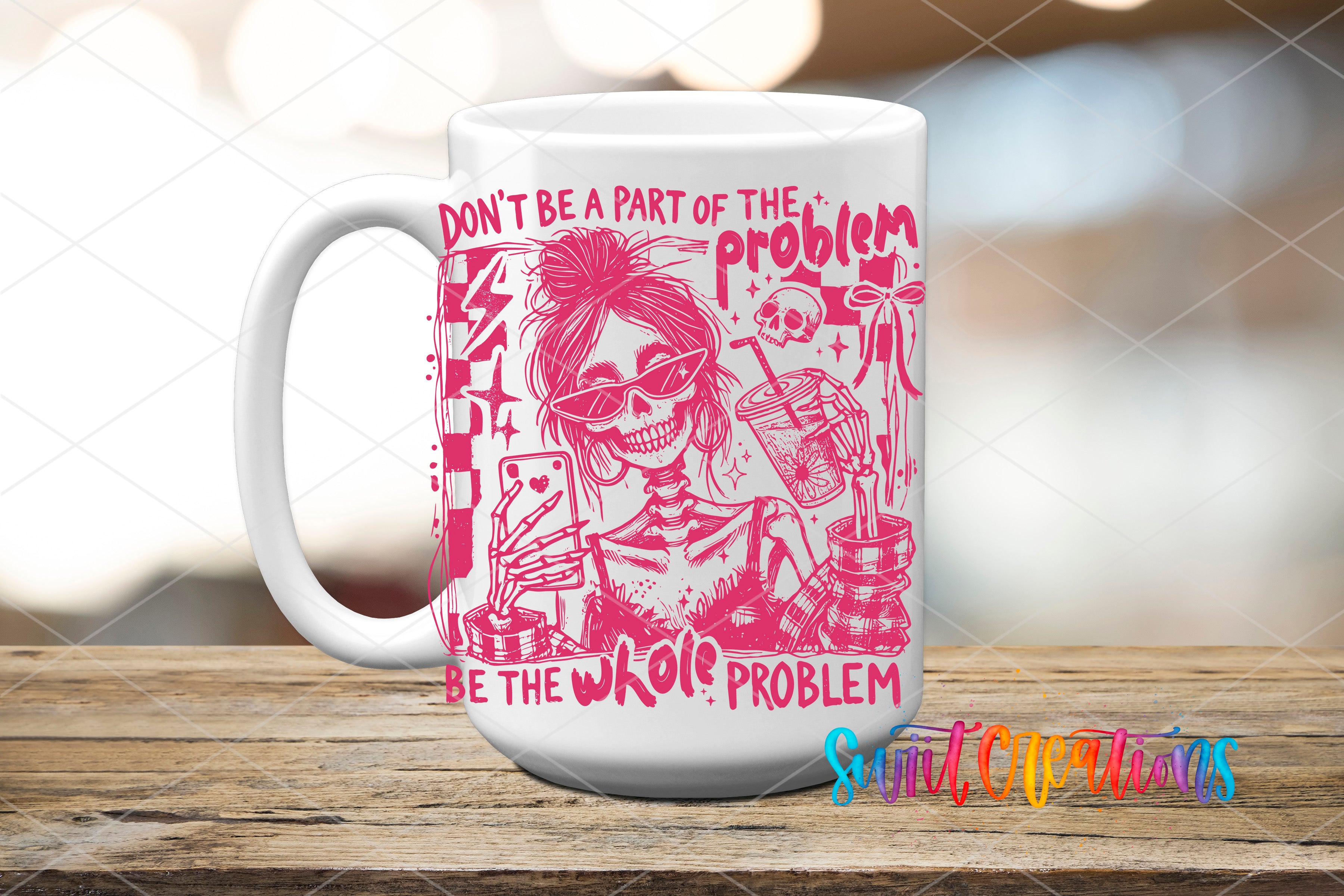 A white mug with a pink design featuring a skeleton wearing sunglasses and holding a drink, along with the text "Don't be a part of the problem, be the whole problem".