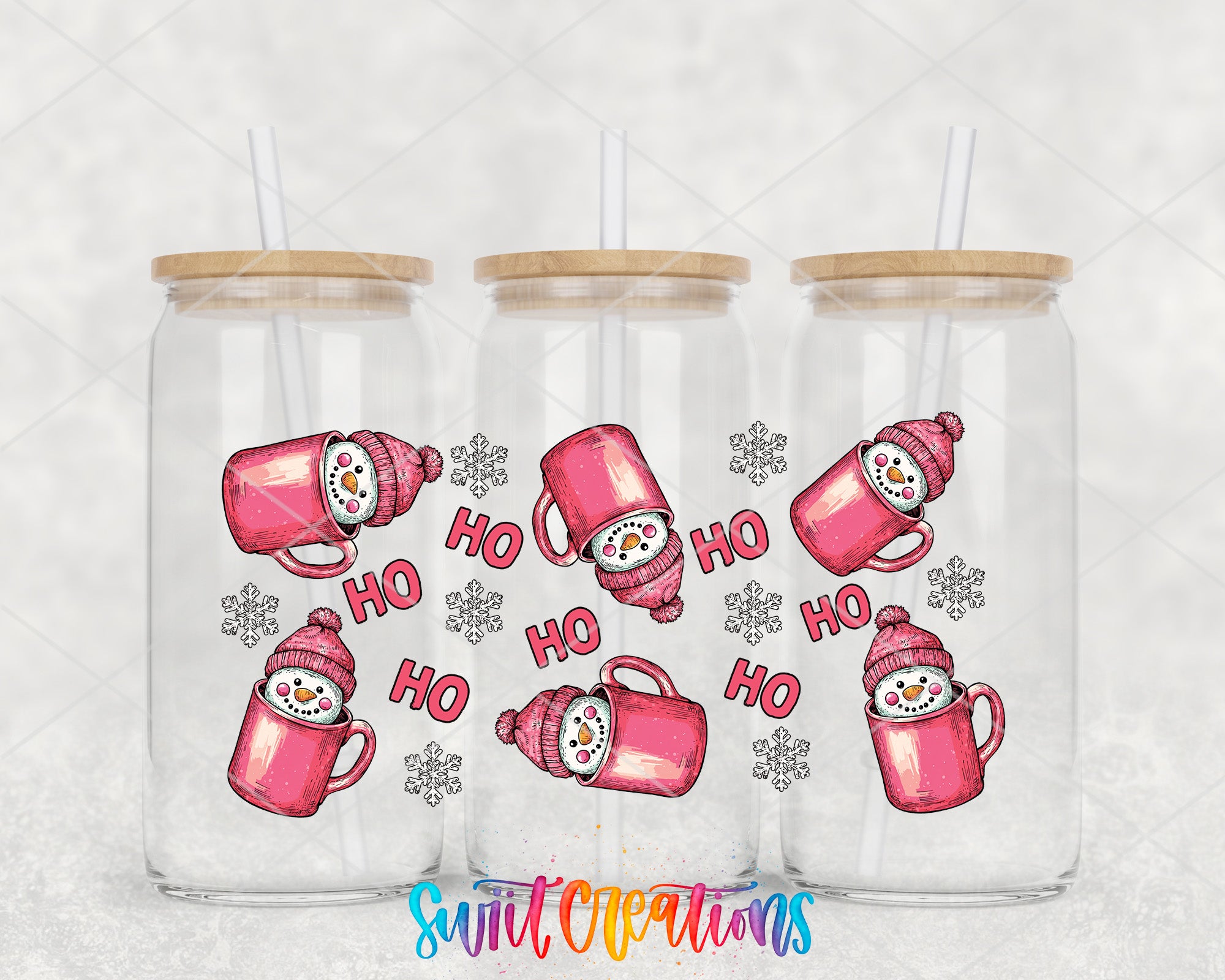 A collection of three glass jars with pink mugs and snowmen on them, along with snowflakes and the text "HO HO HO" printed on them.