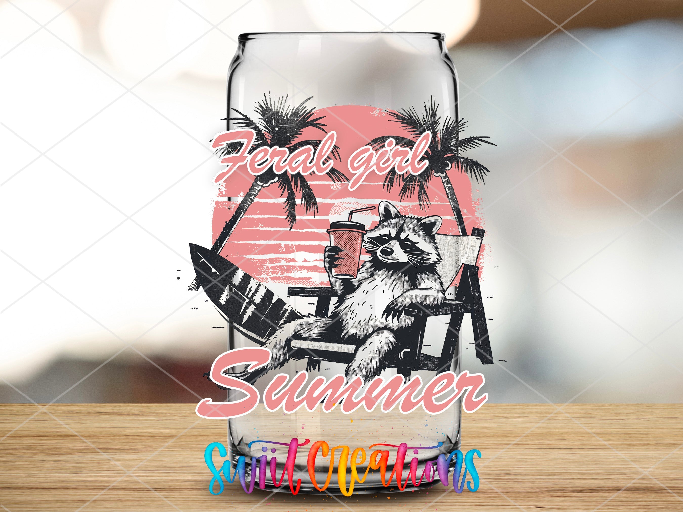 a glass with a raccoon on it sitting on a table
