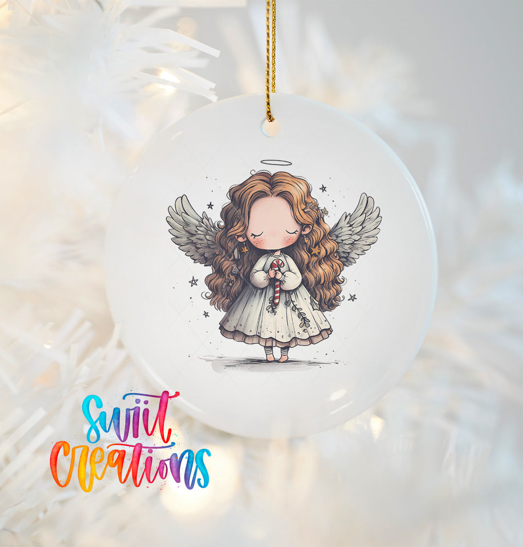 A white ornament with a cartoon illustration of a young girl with curly hair and wings, holding a candy cane.
