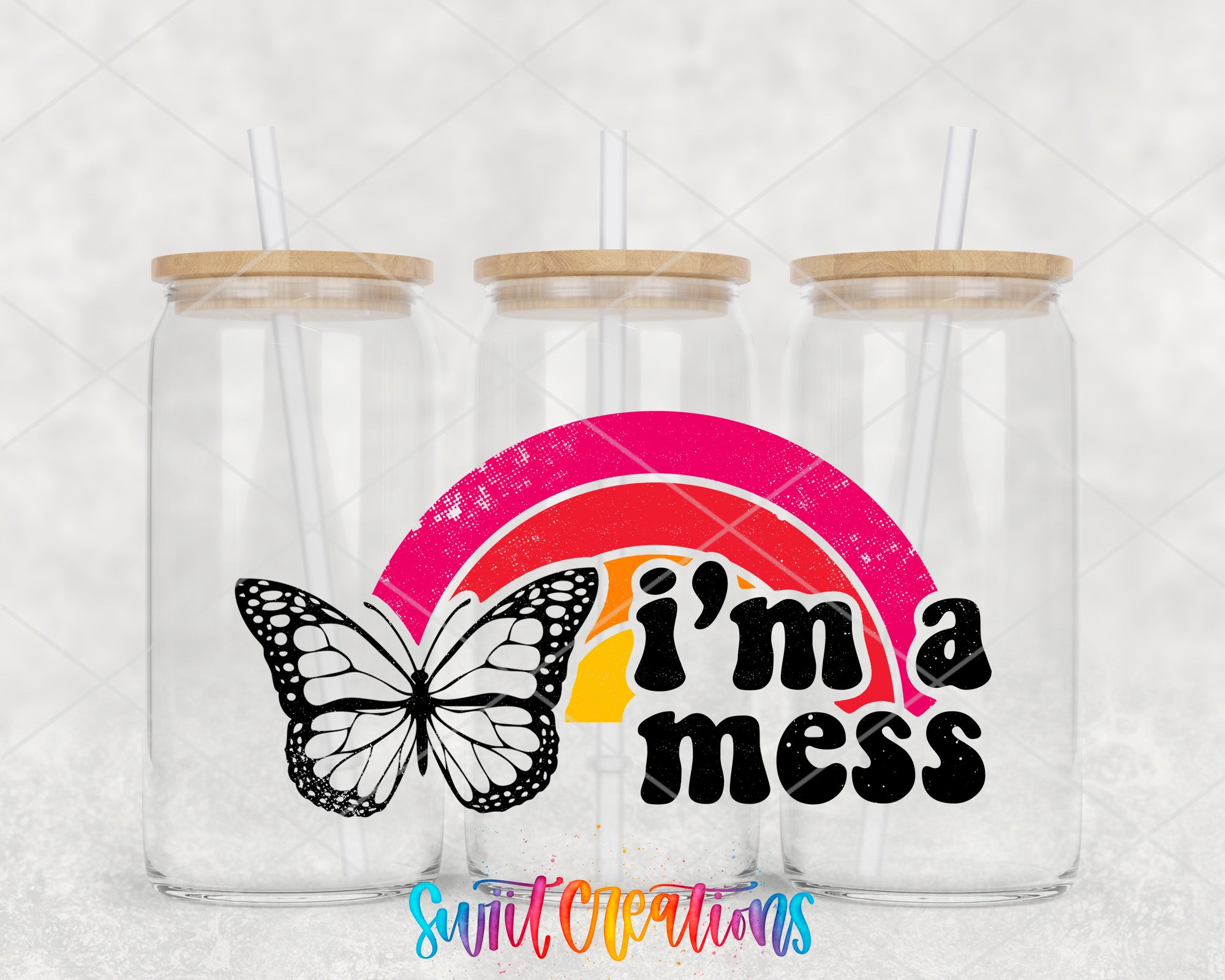 a couple of glass jars with a butterfly on them