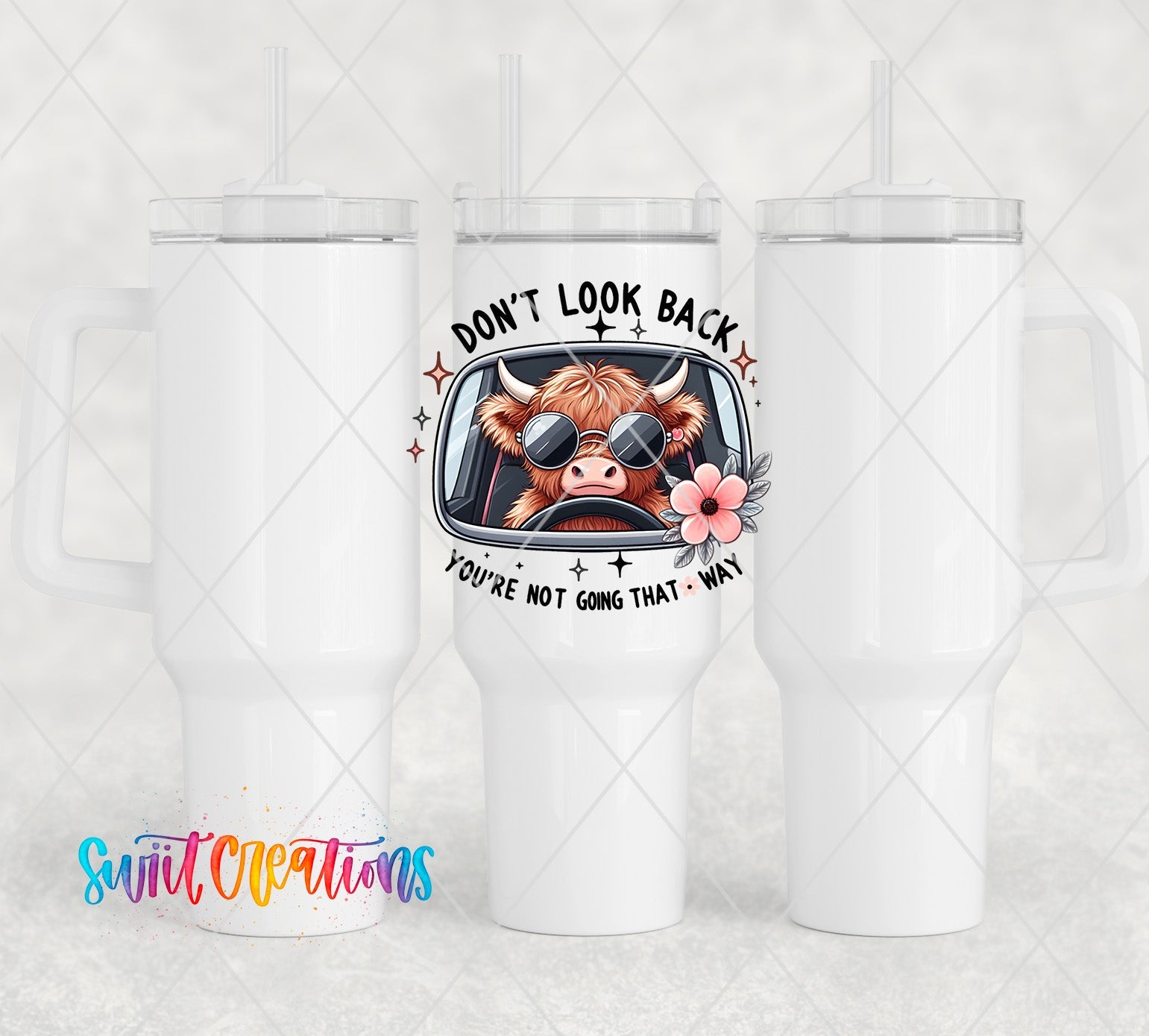two white travel mugs with a picture of a cow on them