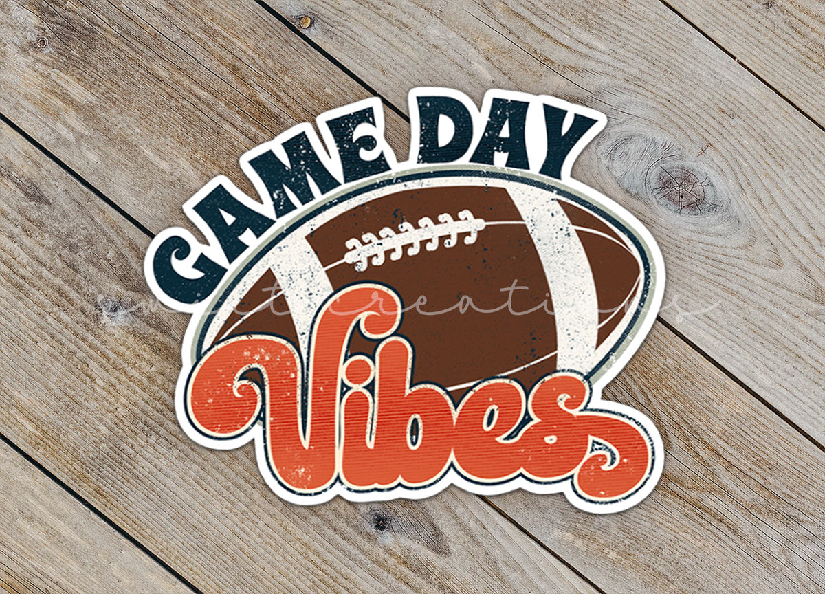 Close-up of the Football Game Day Vibes sticker on rustic wood