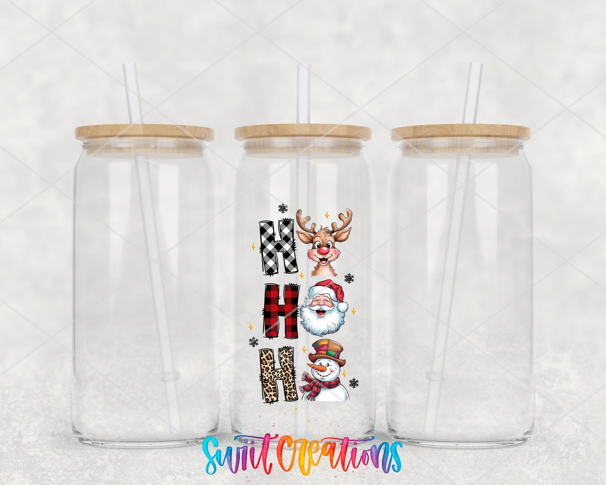 two clear tumblers with santa claus and snowmen on them