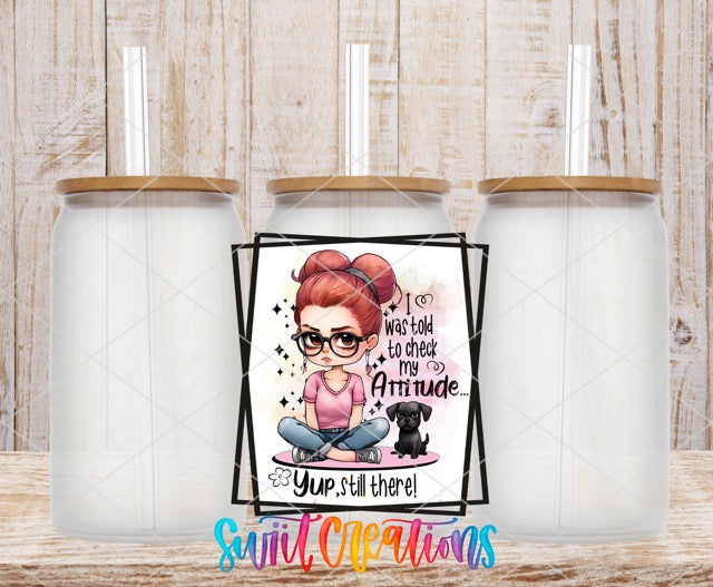 two coffee mugs with a picture of a girl and a dog on them