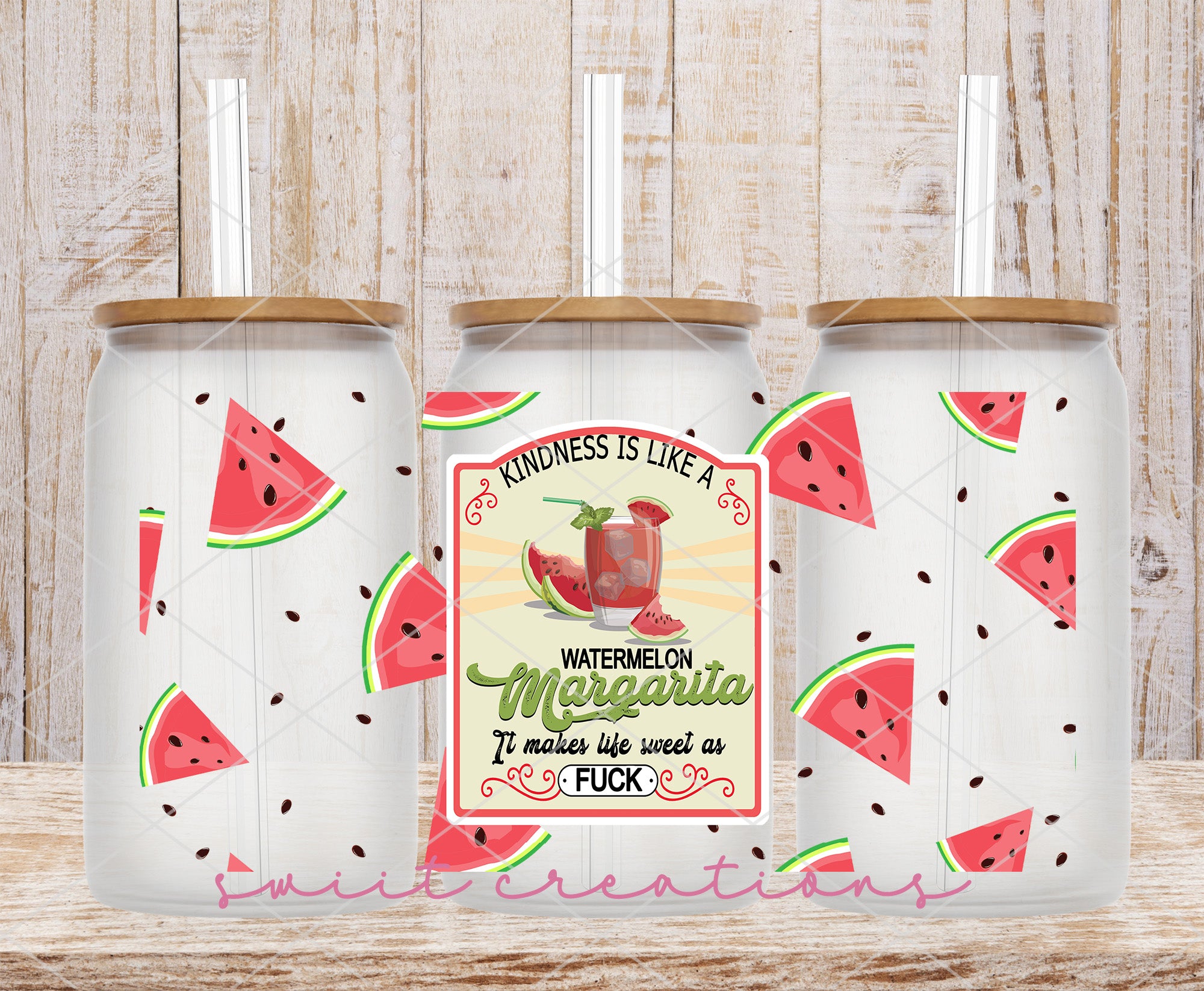 a couple of watermelon juice cans sitting on top of a wooden table