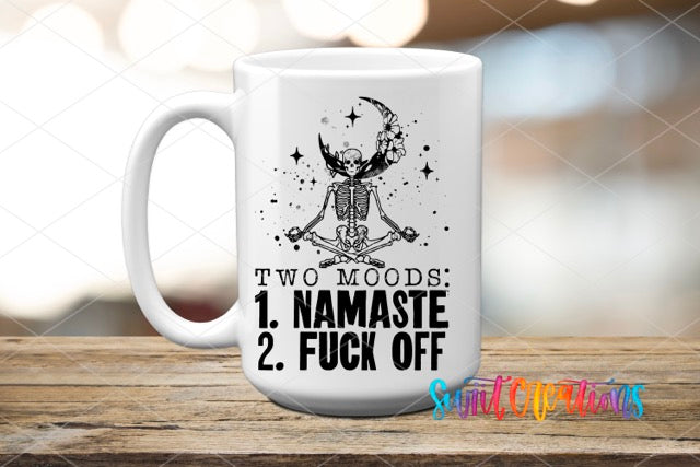 a white coffee mug with a skeleton on it
