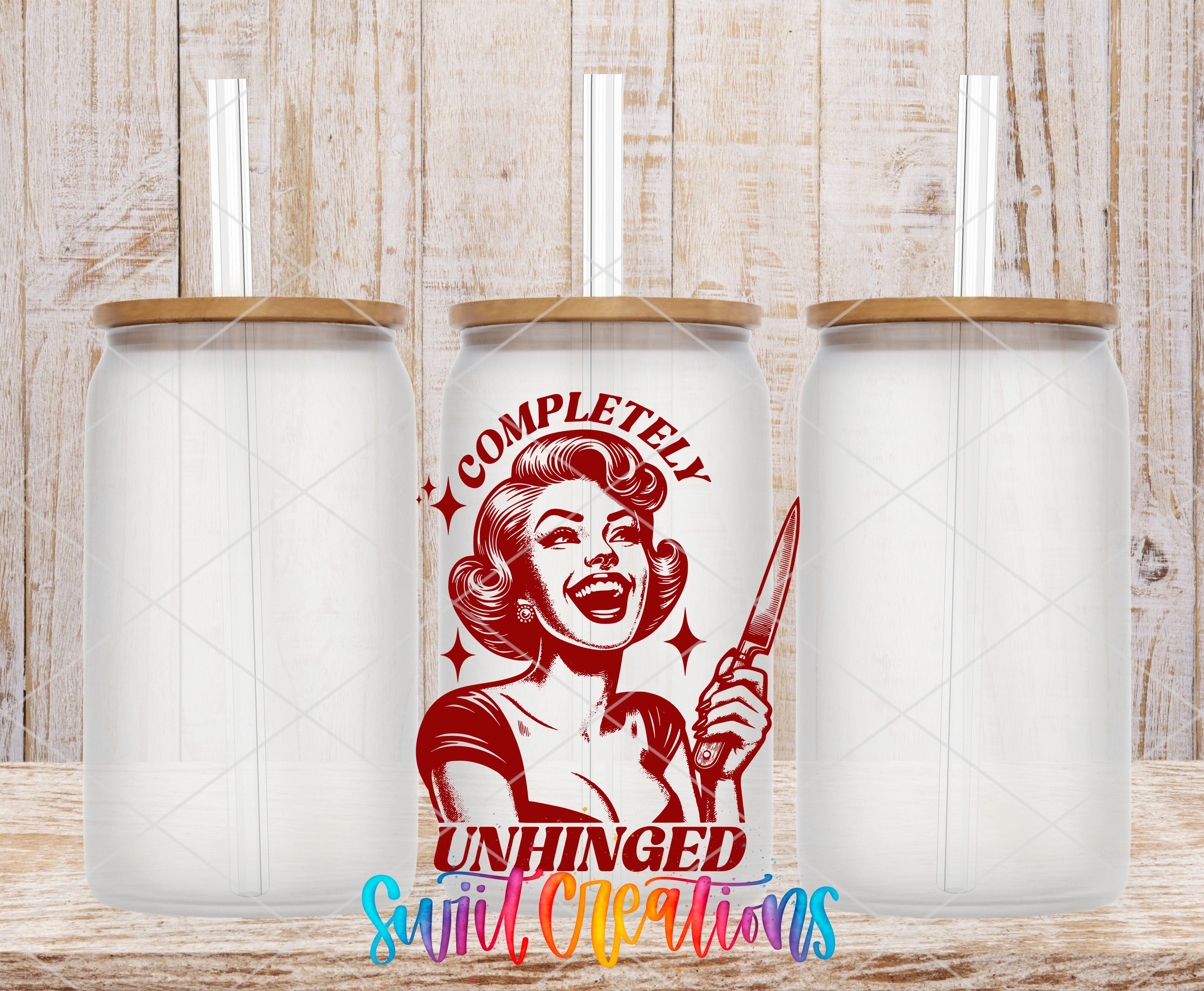 a can with a woman's face and the text "COMPLETELY UNHINGED" on it, along with a straw. The can is placed between two empty glass jars, and there is a colorful text overlay at the bottom of the image.