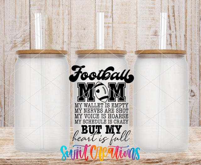 two personalized tumbles with a football mom saying on them