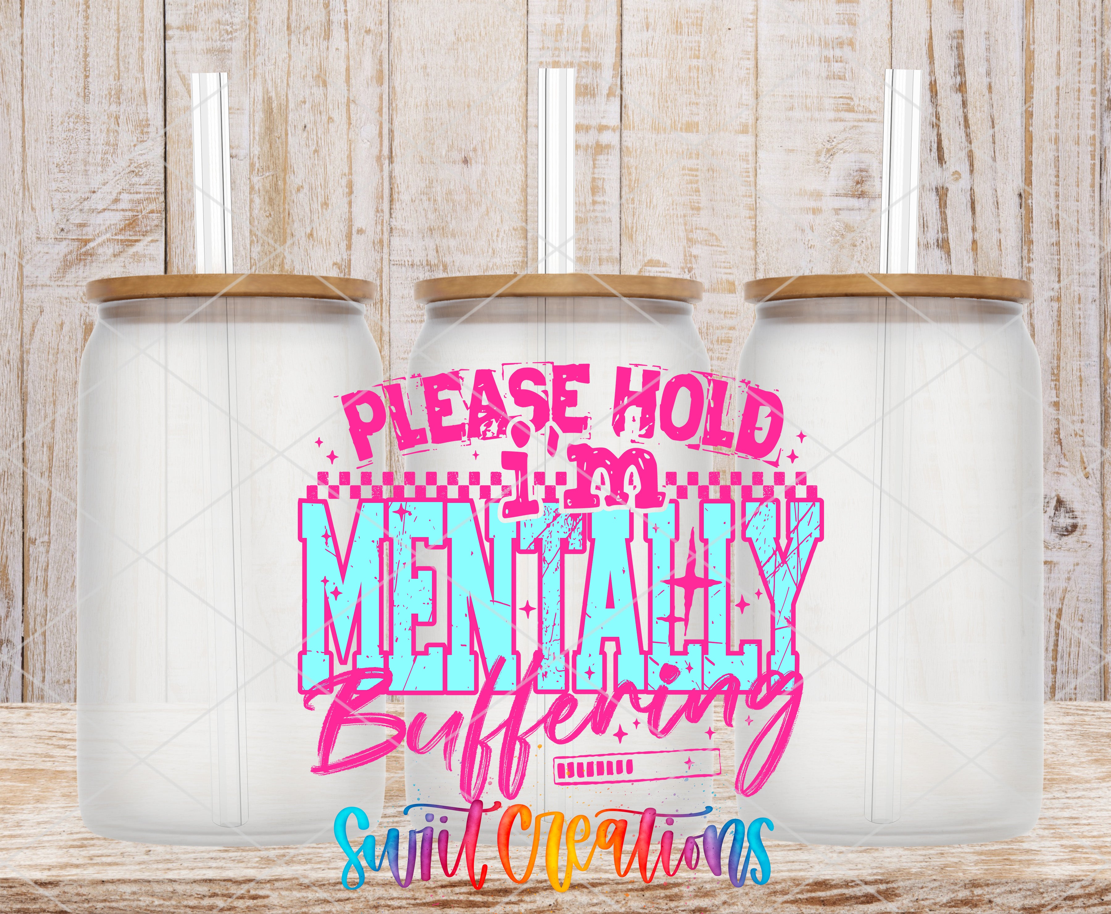 three glass jars with lids, arranged in a row against a wooden background. The jars have straws sticking out of them. The image also contains text that reads "Please hold mentally buffering" and "Suit Creations", which appears to be a promotional or artistic message related to the jars.