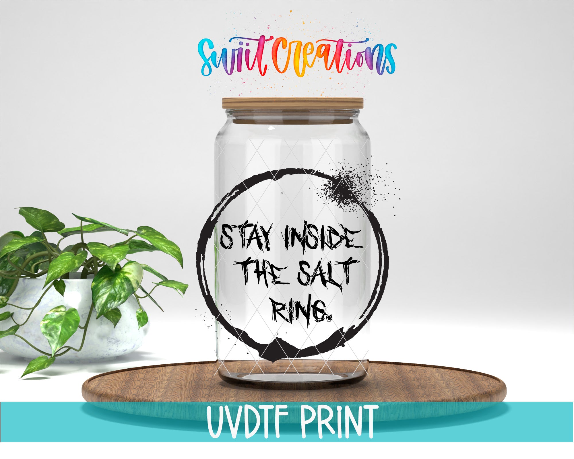 a jar with some writing on it next to a potted plant