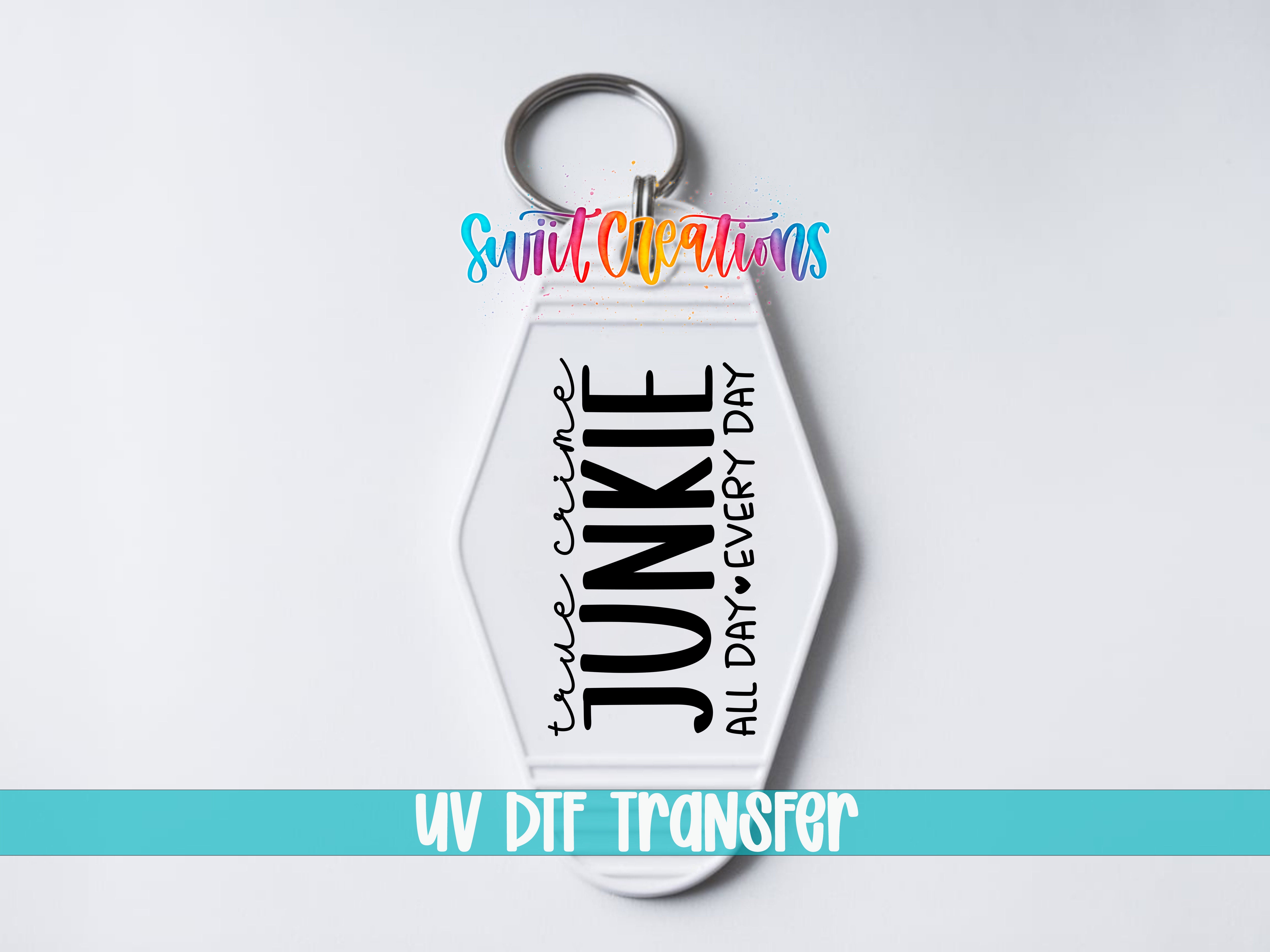 A keychain with the text "JUNKIE ALL DAY EVERY DAY" printed on it, along with a colorful logo above.