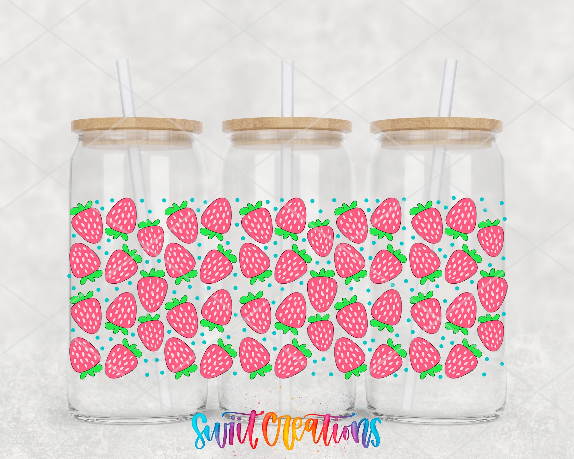 Three glass jars with wooden lids, each containing a pattern of pink strawberries with green leaves.