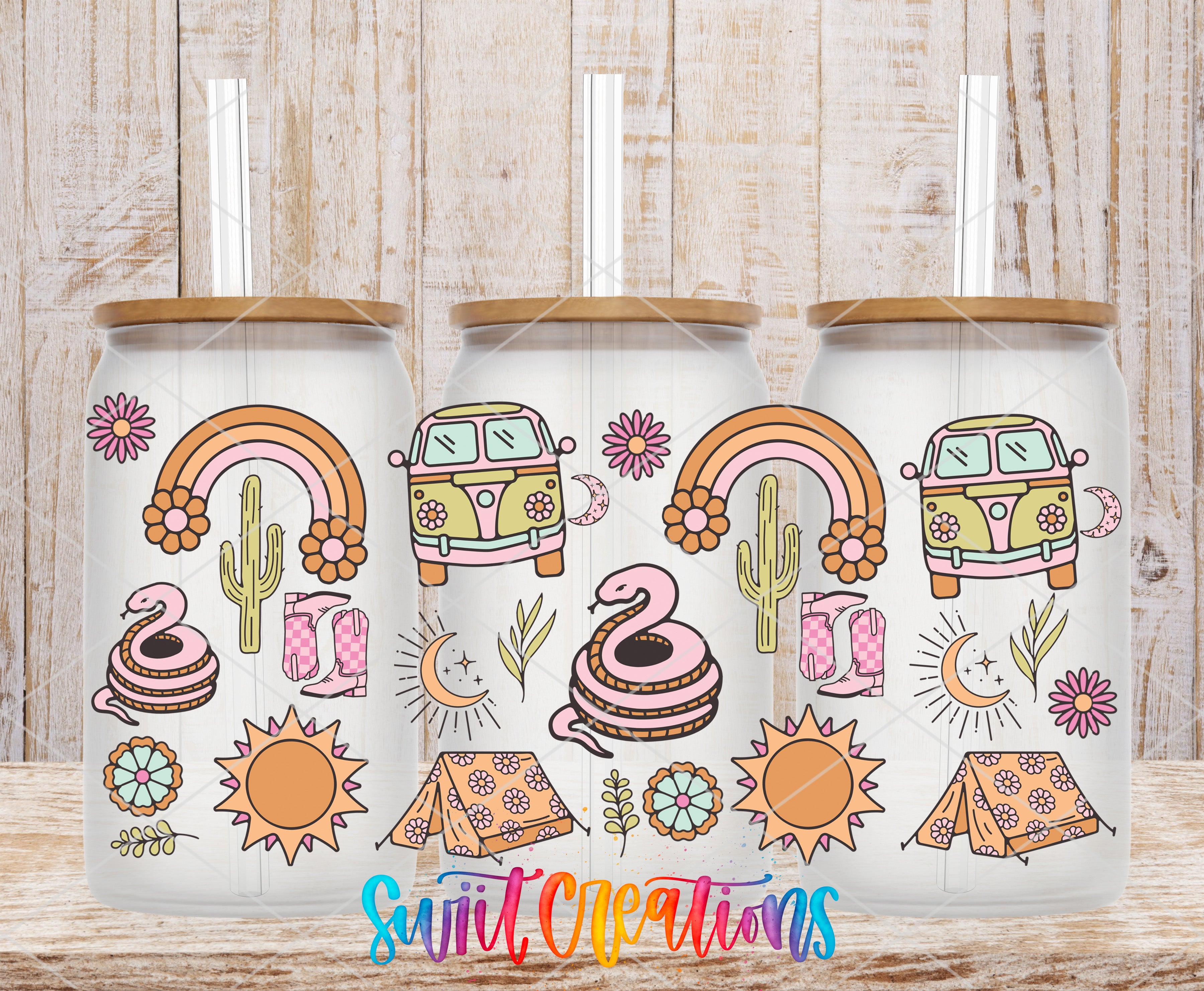 Three glass tumblers with colorful illustrations and designs on them, including a rainbow, a van, a snake, a cactus, and various other elements.