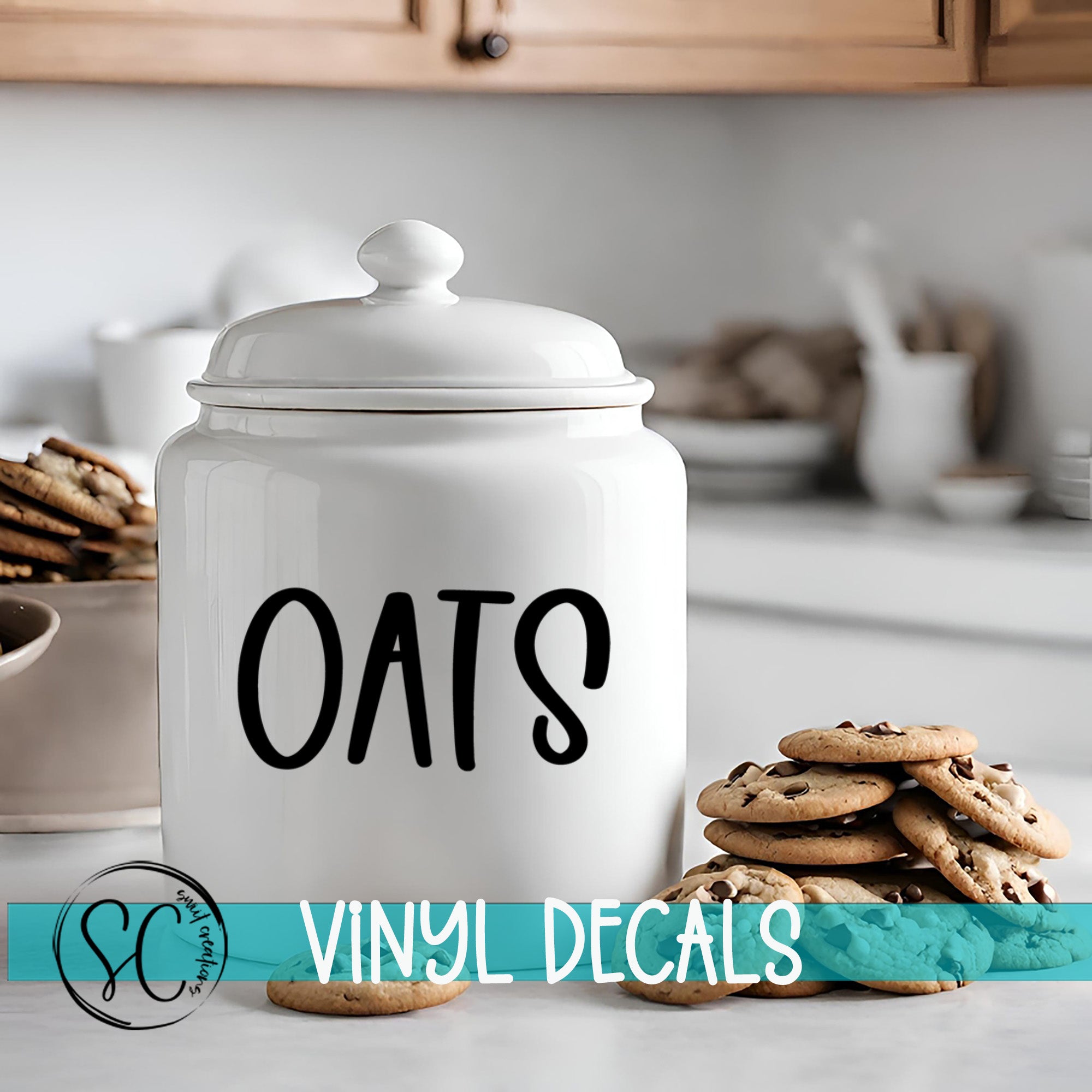 A white ceramic jar labeled "OATS" sits on a kitchen counter, surrounded by stacks of chocolate chip cookies.