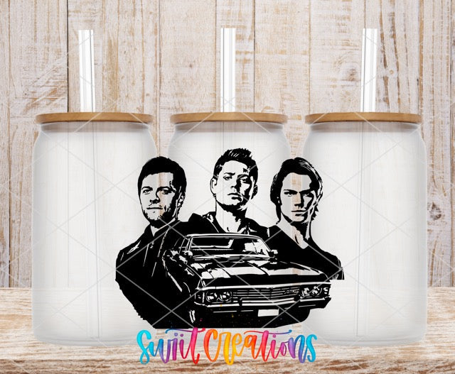 two mugs with the image of two men holding a car