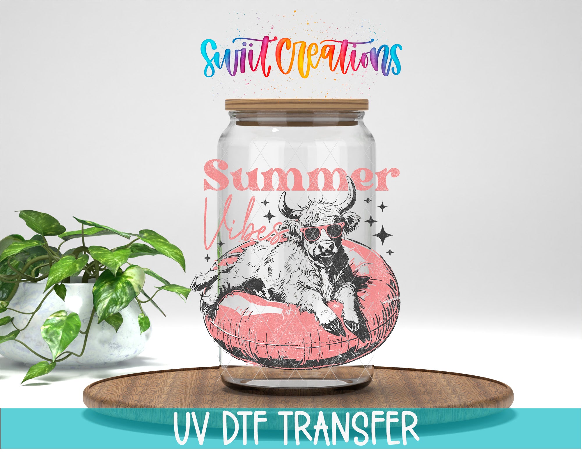 a glass jar with a cow illustration and the text "Summer Vibes" on it, placed on a wooden surface.