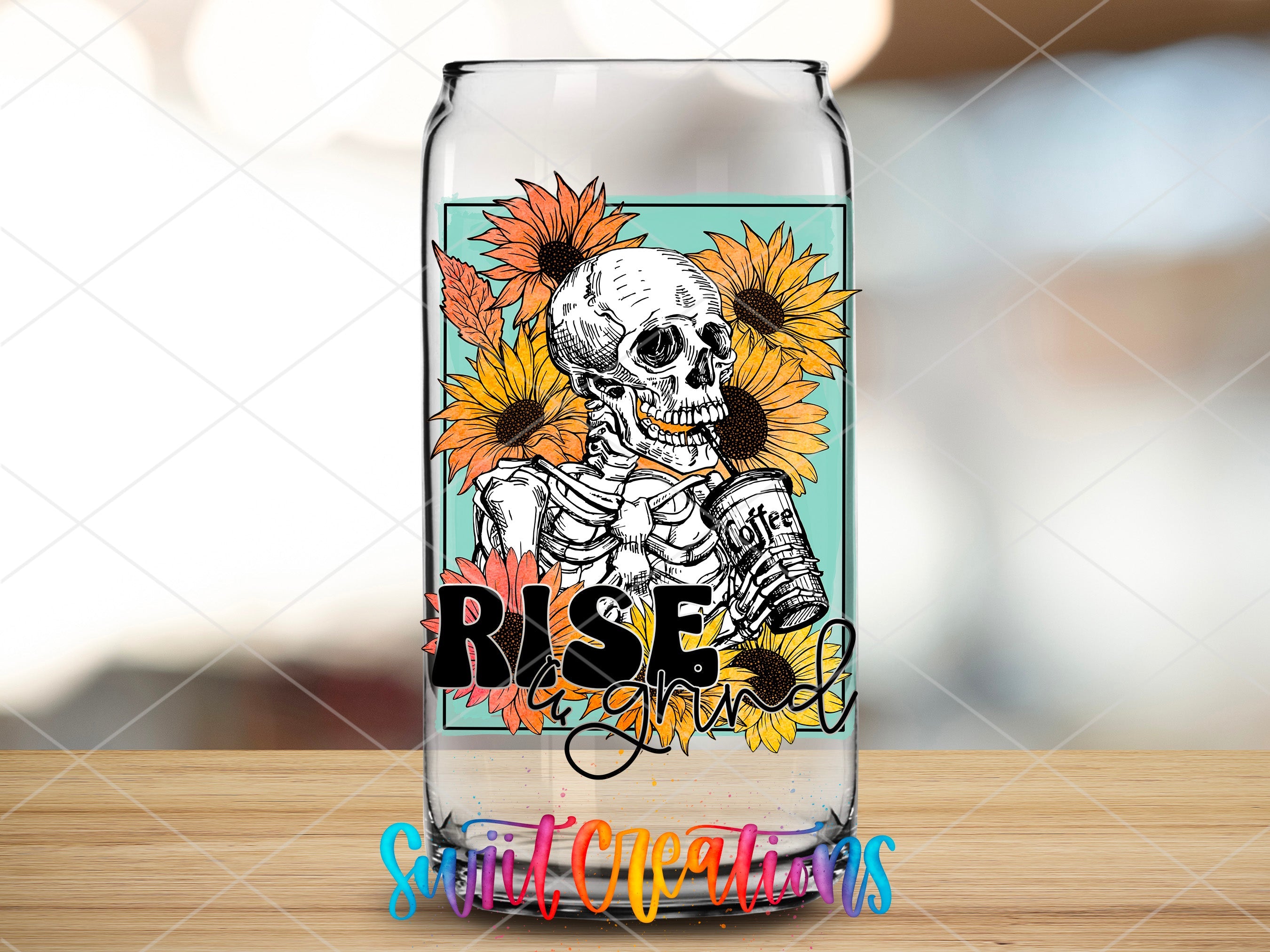 a glass with a skeleton and sunflowers on it