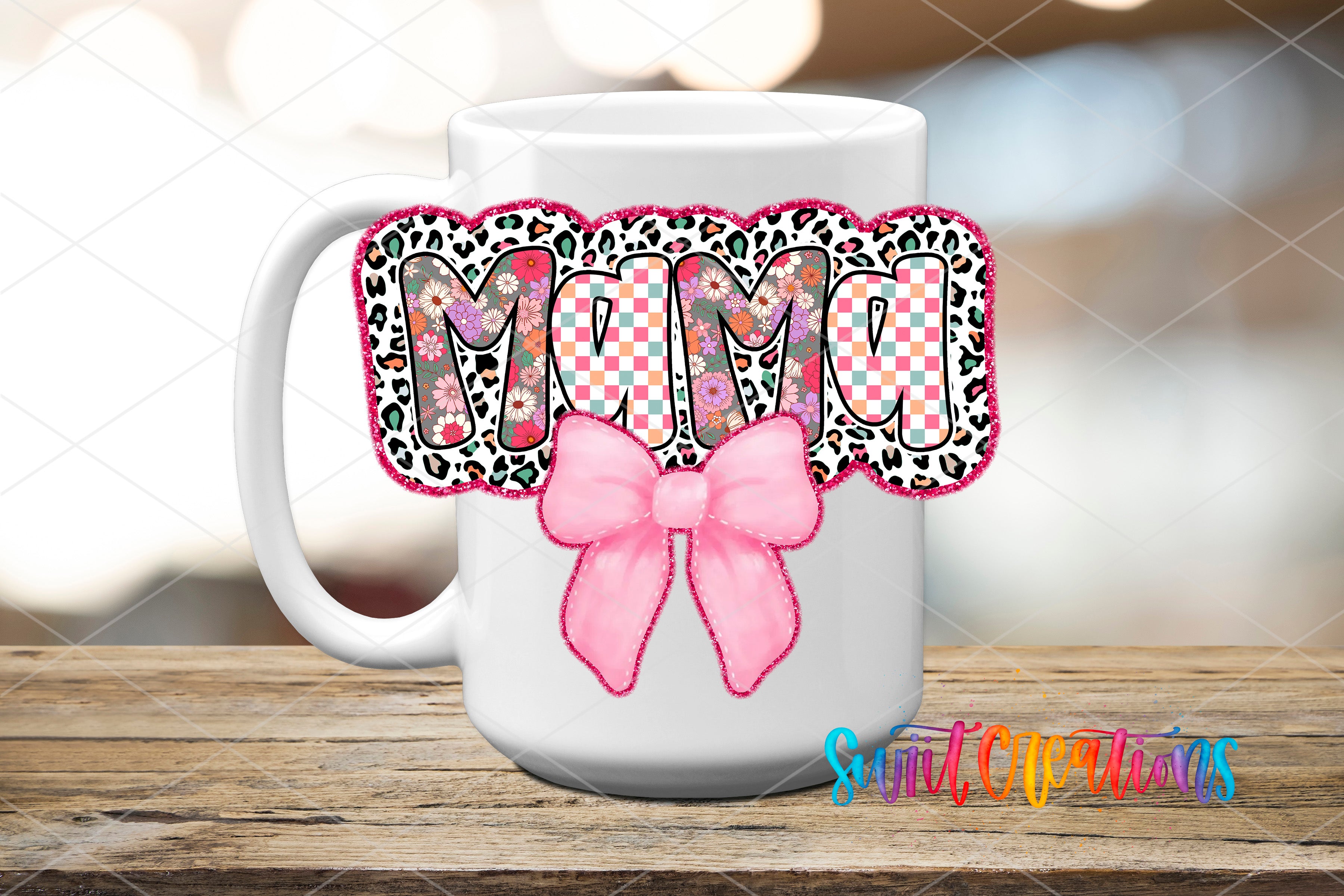 a white coffee mug with a pink bow on it