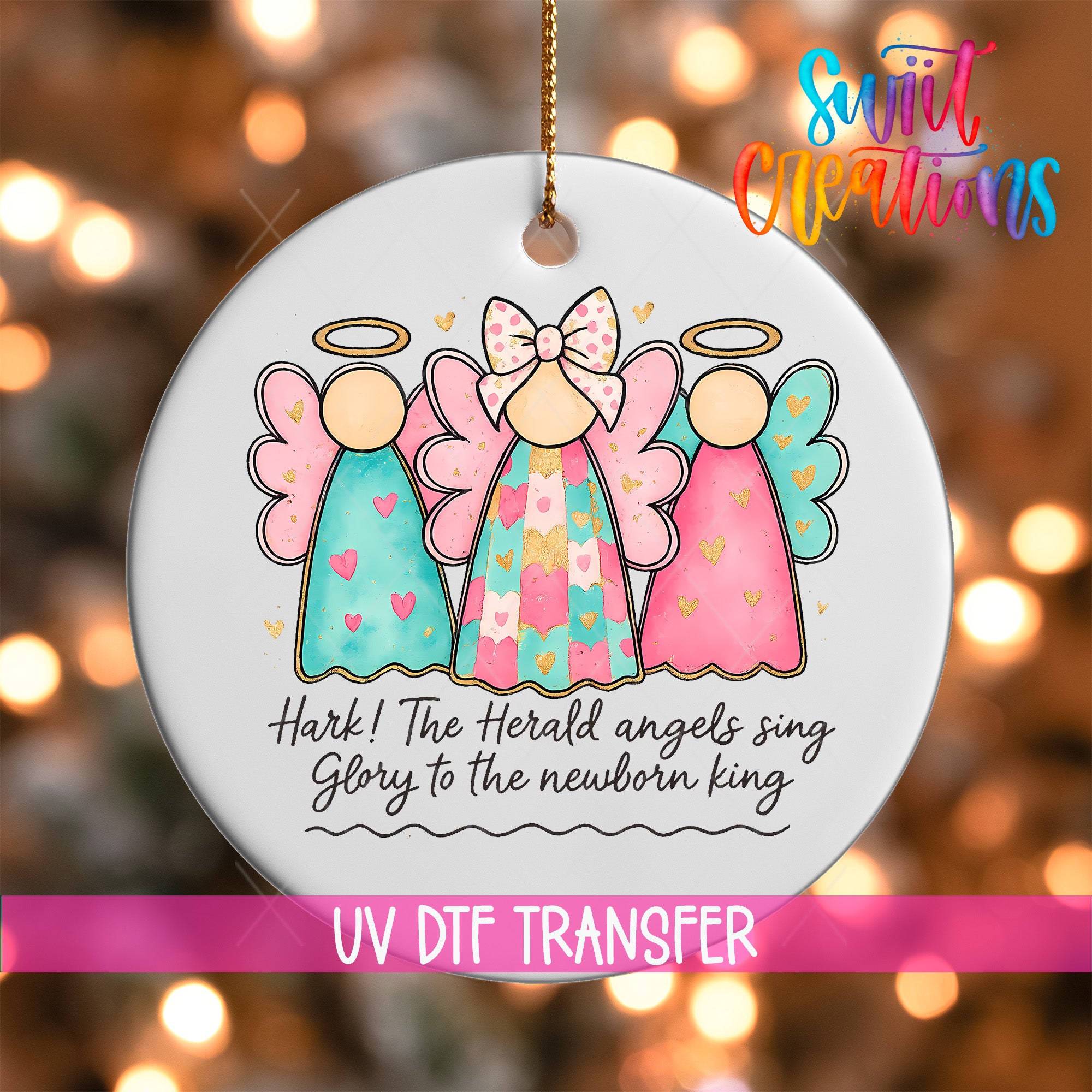 A decorative ornament featuring three colorful angel figures with haloes, accompanied by the text "Hark! The Herald angels sing glory to the newborn king" and "UV Dtf Transfer".