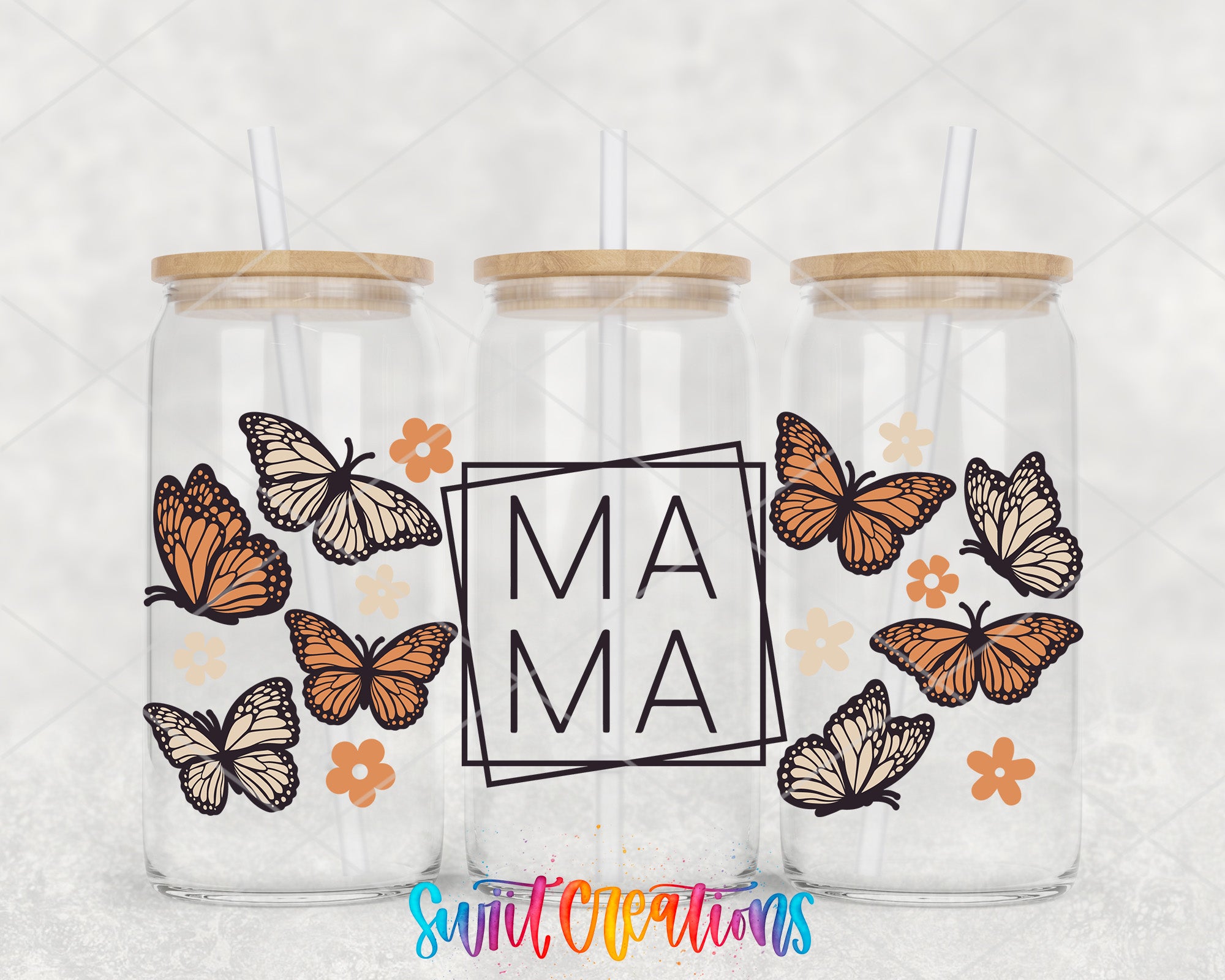 Three glass tumblers with butterfly and flower designs, each with a straw lid. The text "MAMA" is displayed in the center of the tumblers.