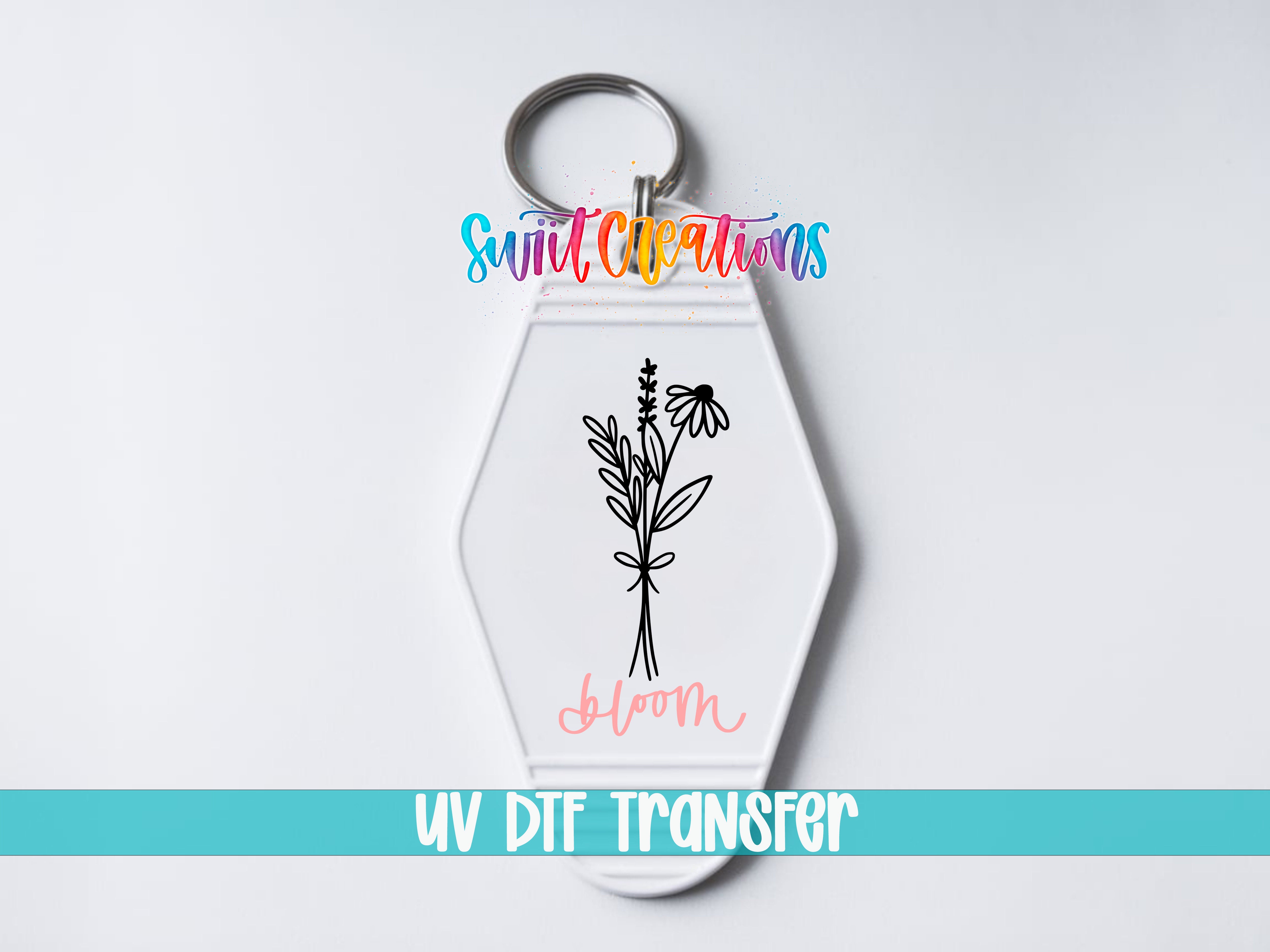 A keychain with a floral design and the text "Sunlit Creations" printed on it.