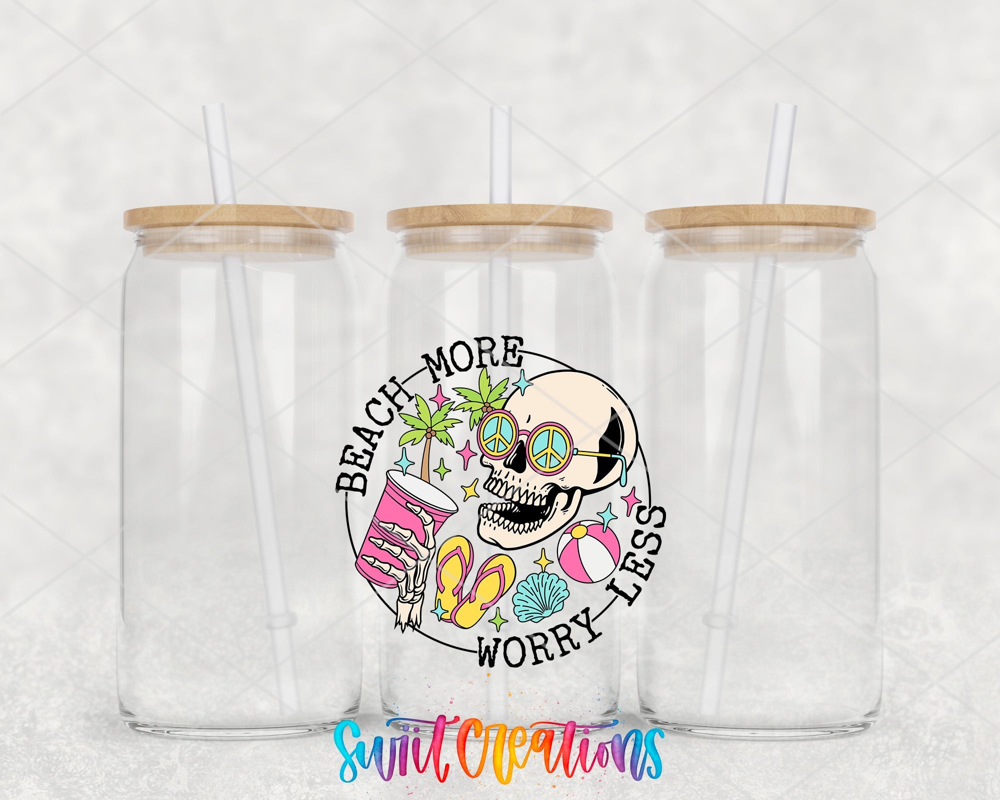 two clear tumblers with a skull on the side