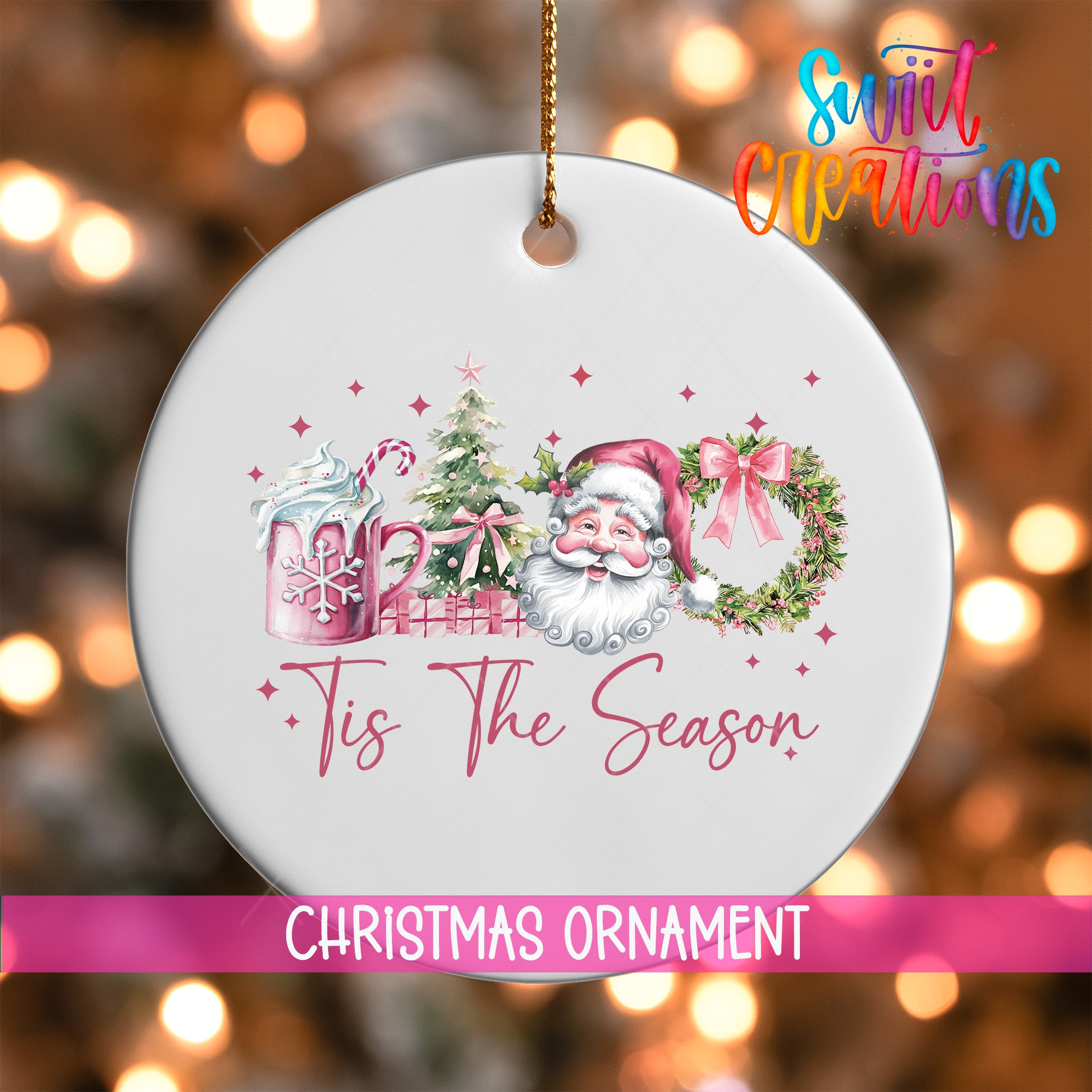 A white Christmas ornament with a Santa Claus design, surrounded by festive decorations such as a wreath and a mug with a snowflake pattern.