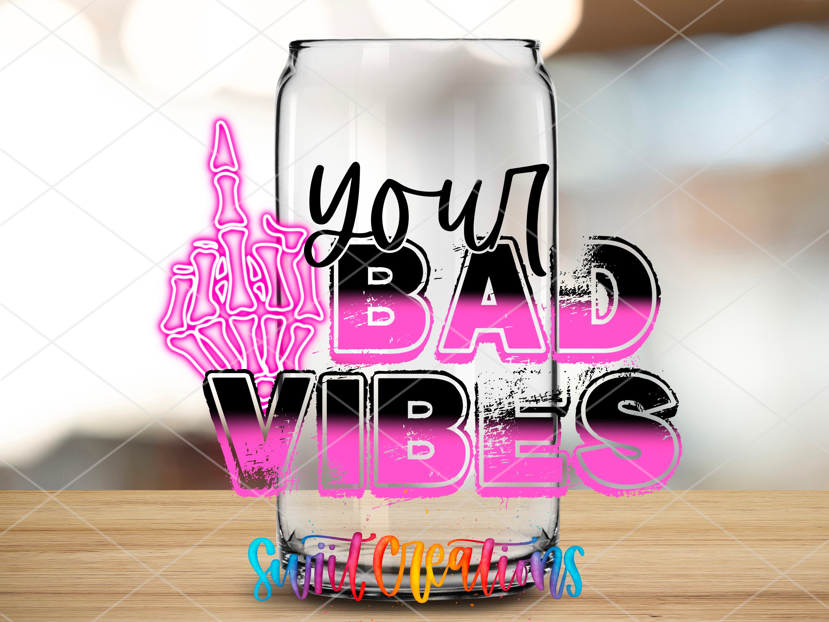 a glass with the words you bad vibes painted on it