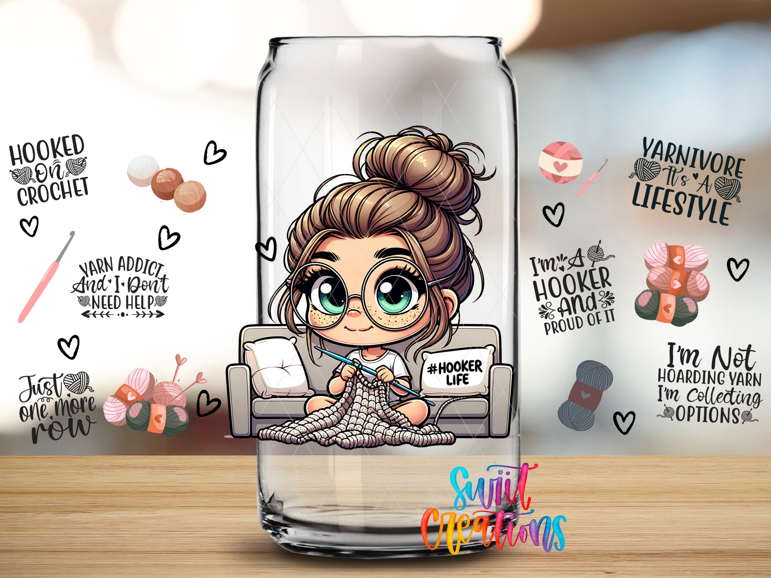 a glass mug with a cartoon illustration of a woman sitting on a couch and knitting. The mug is surrounded by various crochet-related items and text, including phrases like "Hooked on crochet", "Yarn addiction", "I'm a hooker", "HOOKER LIFE", and "I'm not hoarding yarn".