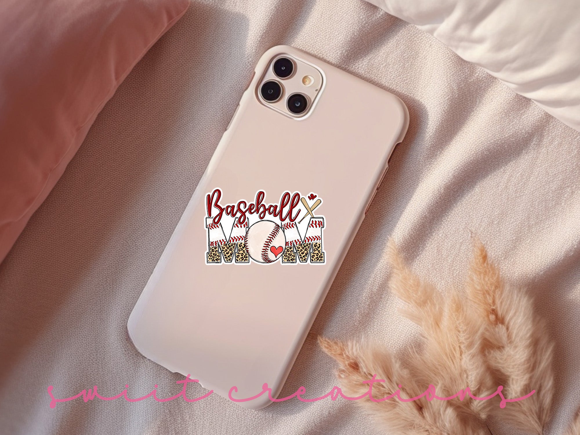 a phone case sitting on top of a bed