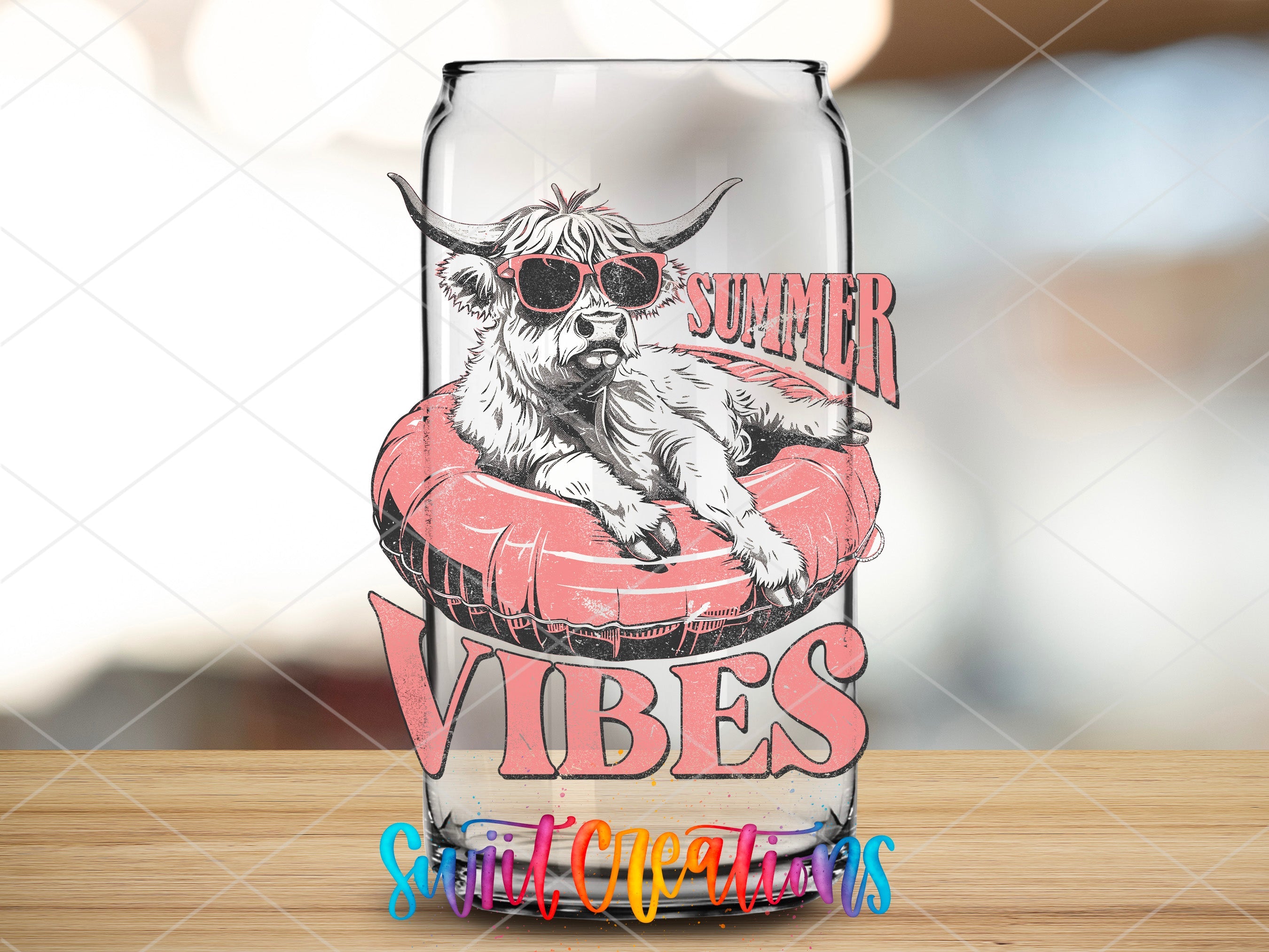 a glass with a picture of a cow wearing sunglasses