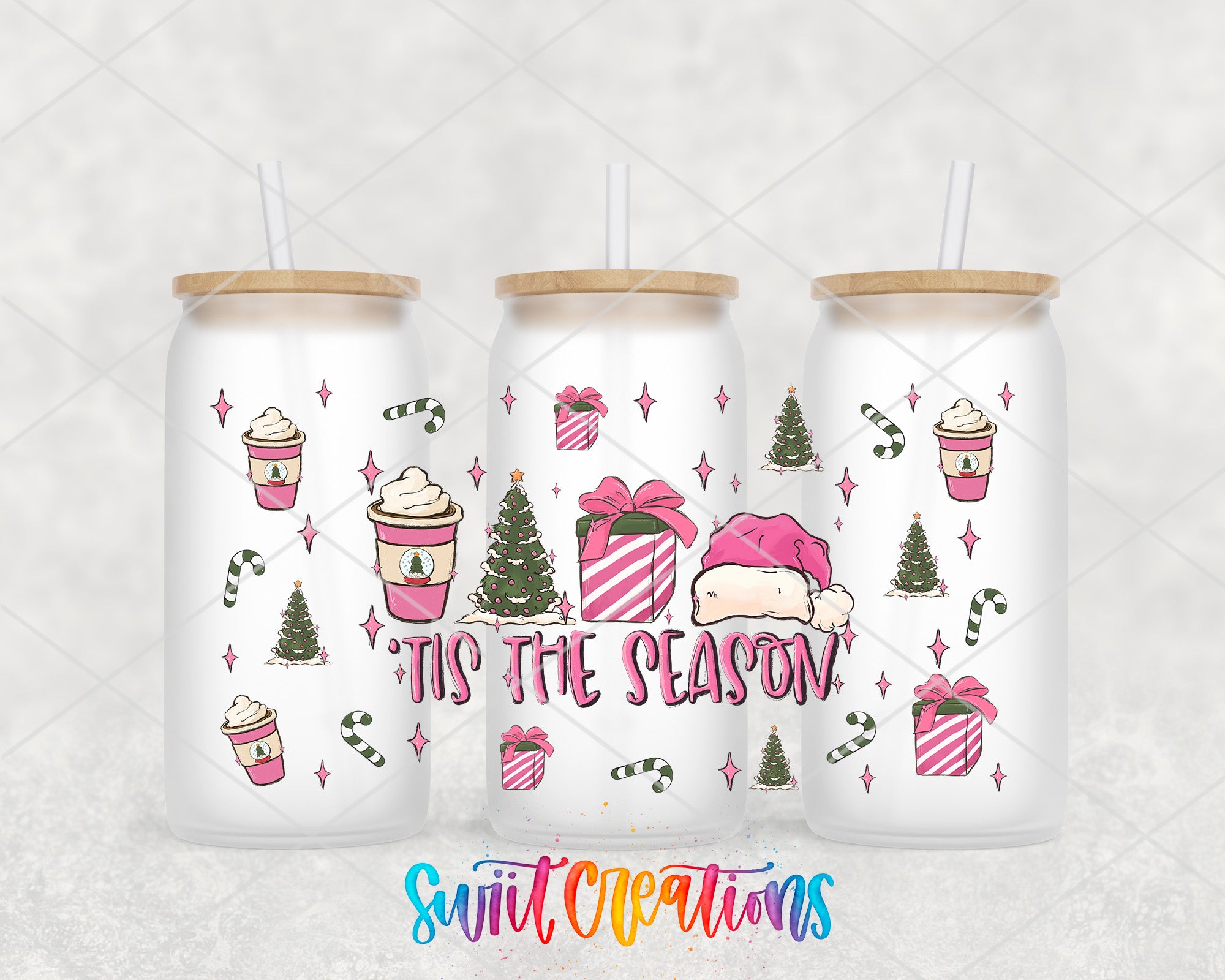 three tumblers with christmas themed designs on them