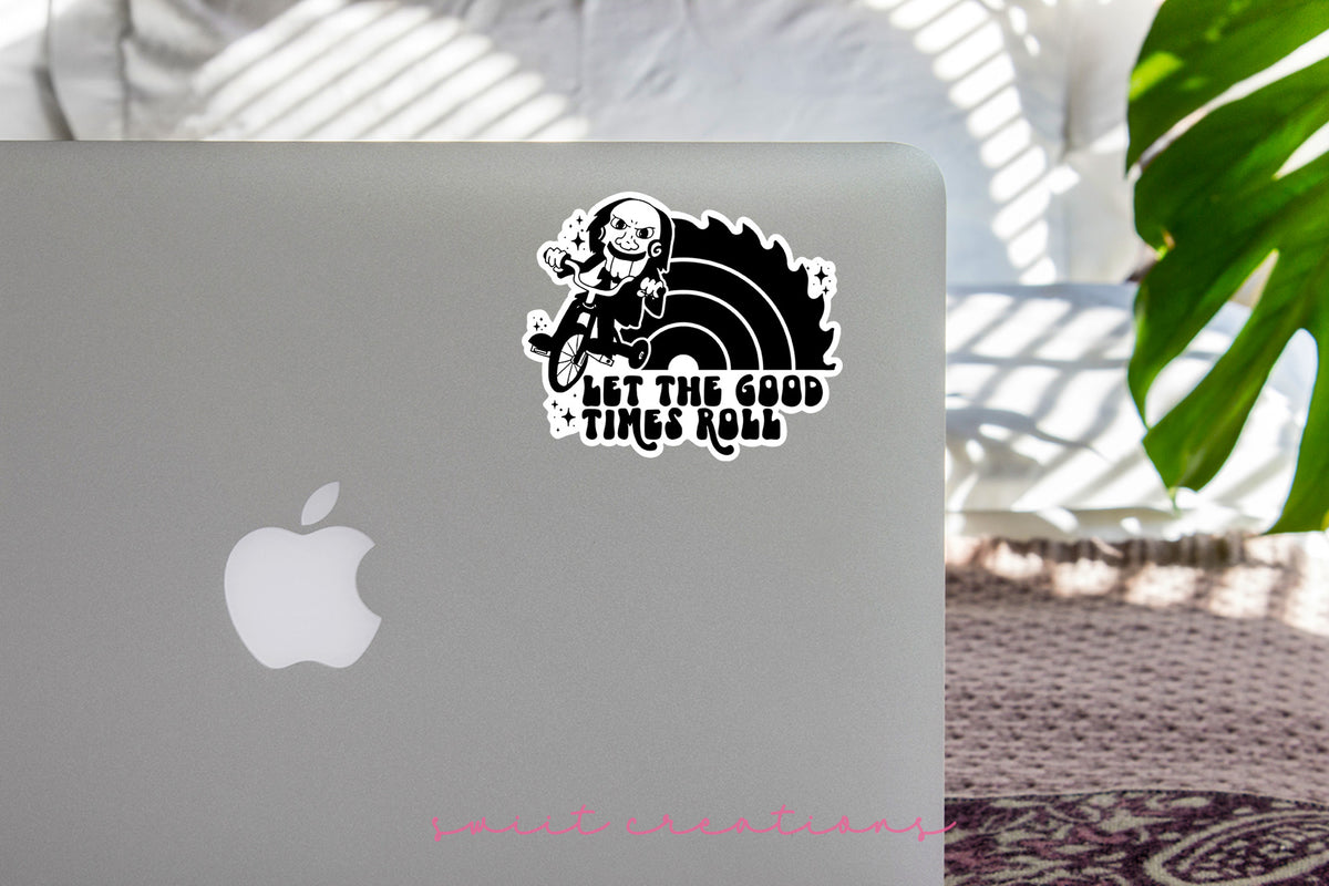 Let the Good Times Roll Horror sticker on the lid of a silver laptop