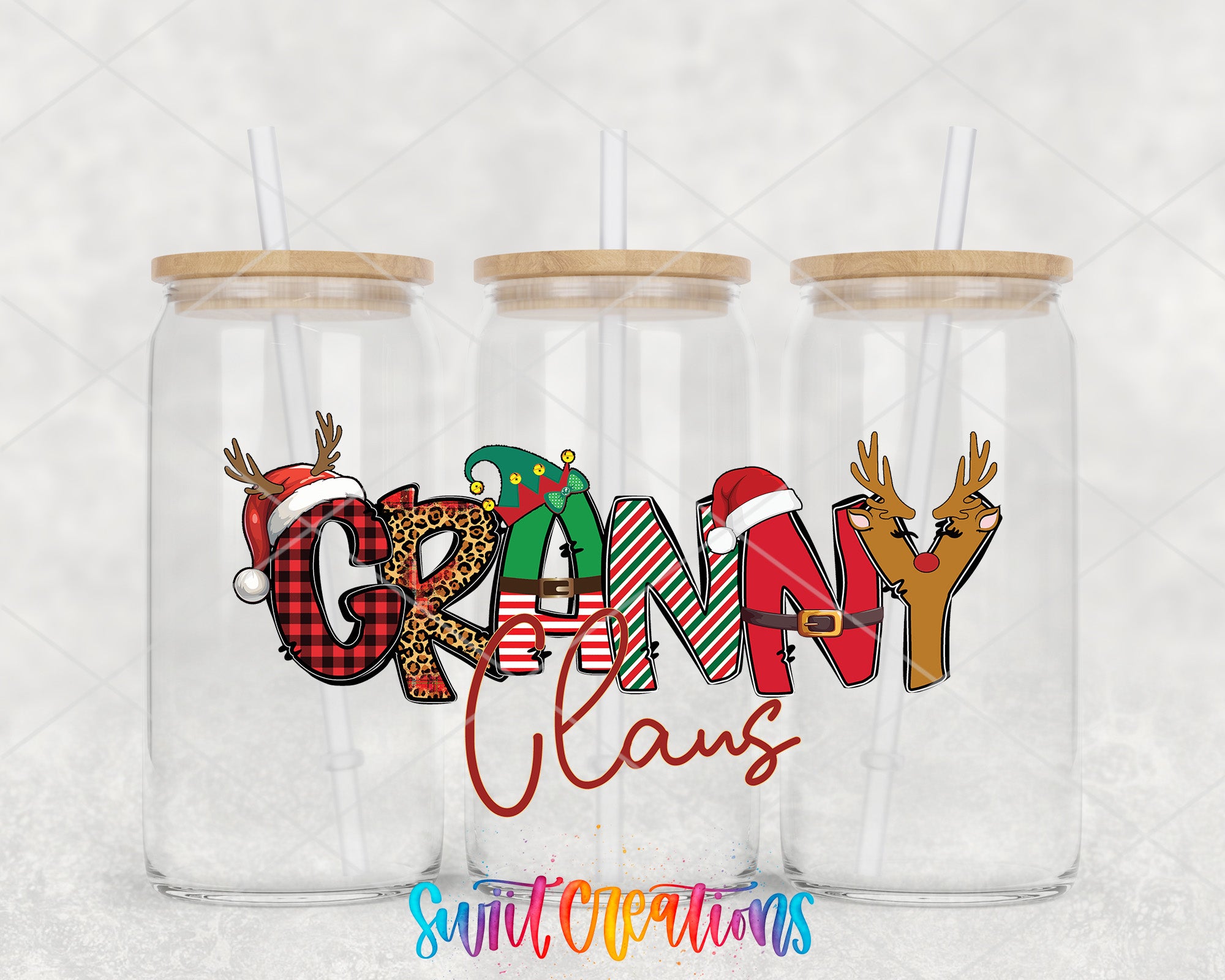 a couple of glass cups with christmas decorations on them