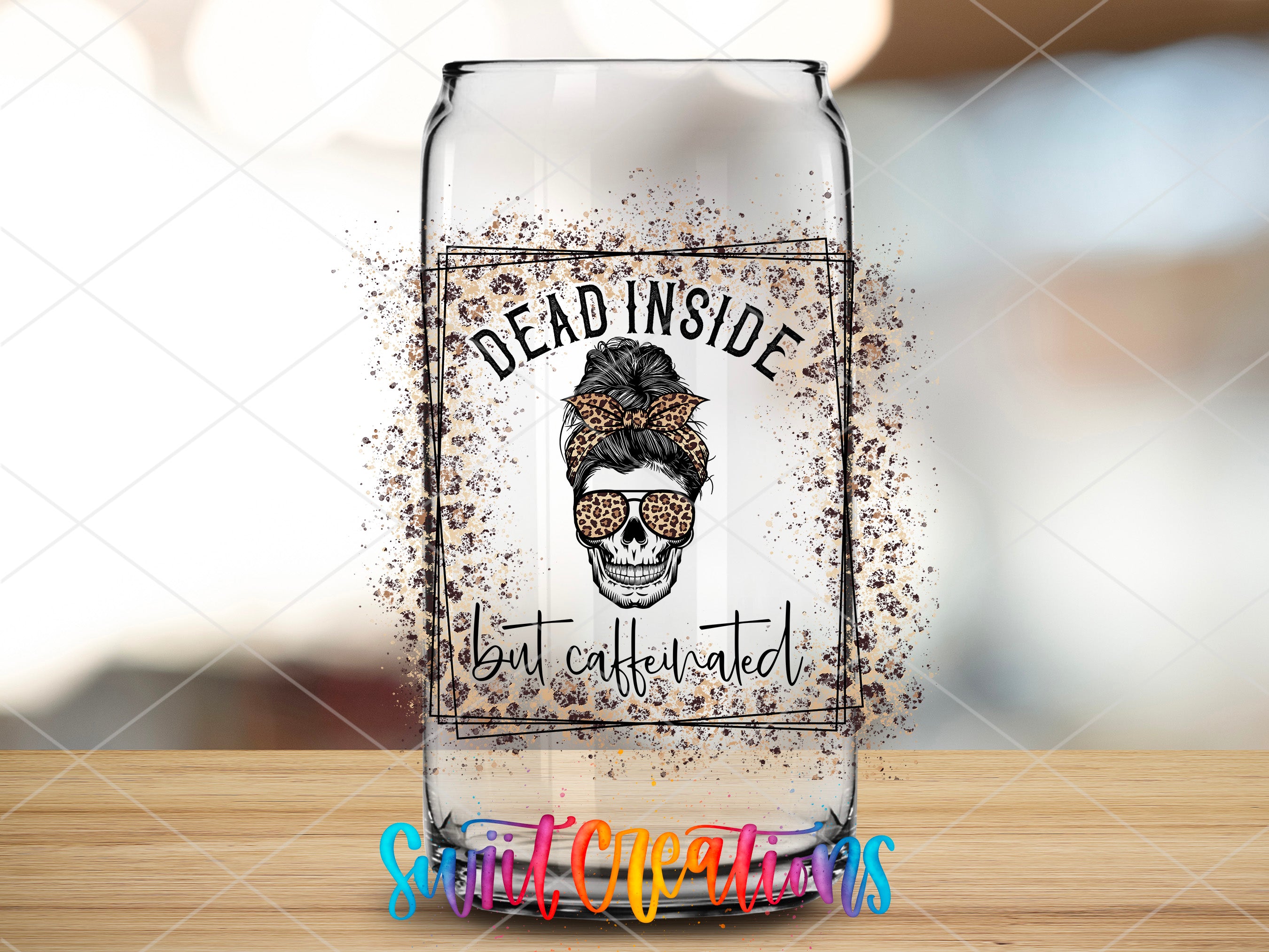 a glass jar with a picture of a skull on it