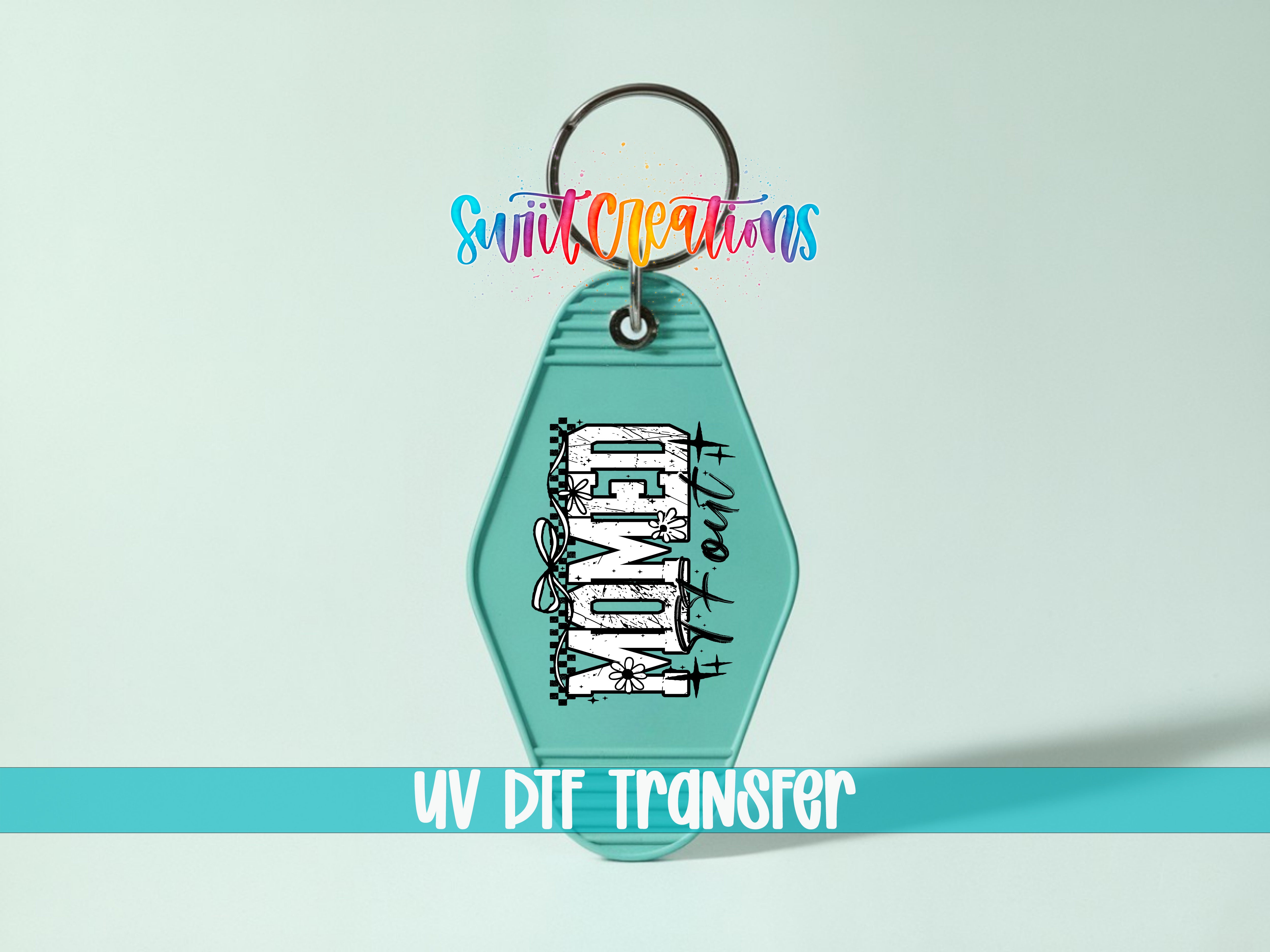 A keychain with a teal color and the word "DEMON" printed on it, along with a colorful logo and text.
