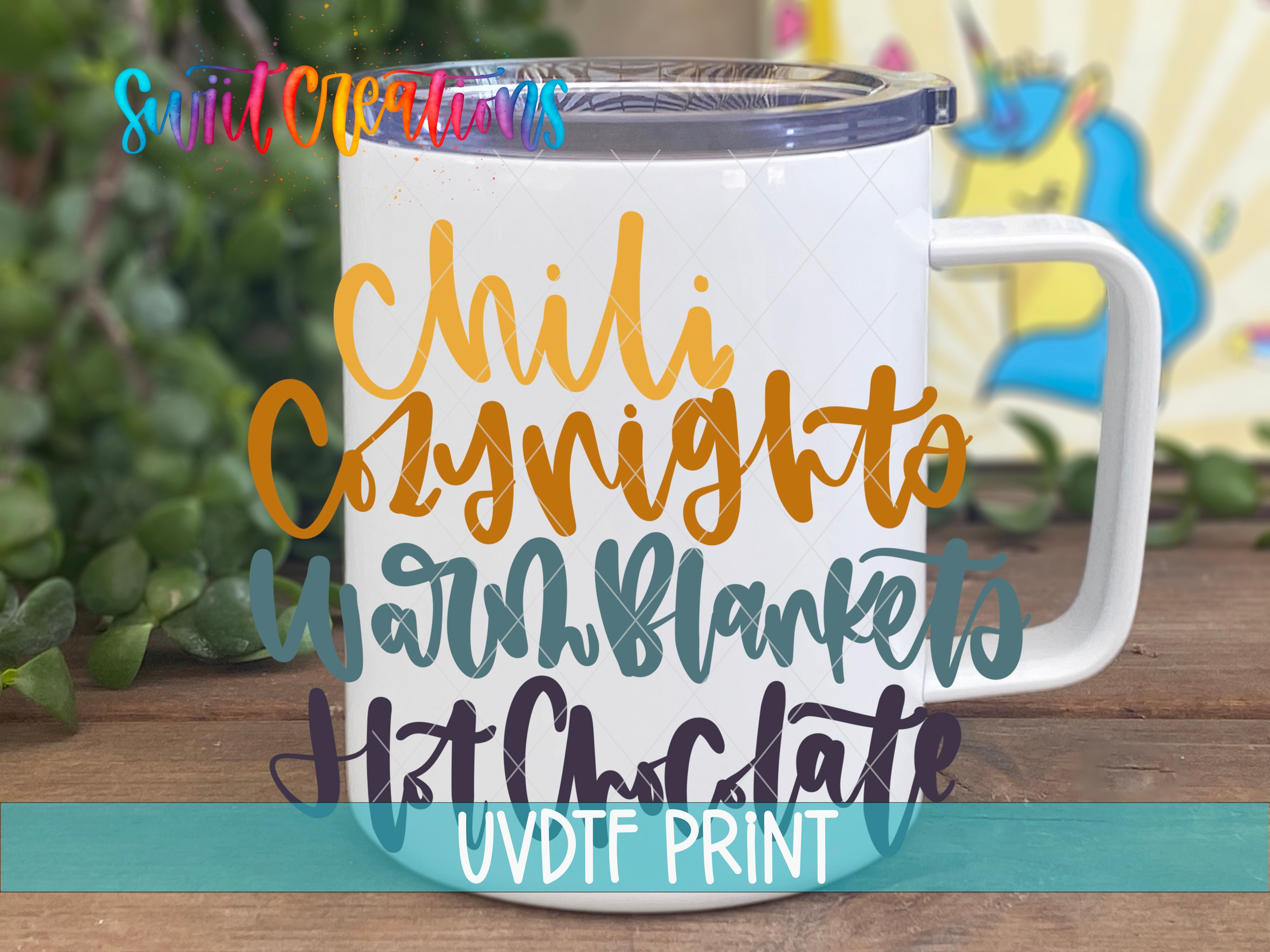 a white coffee mug with colorful lettering on it
