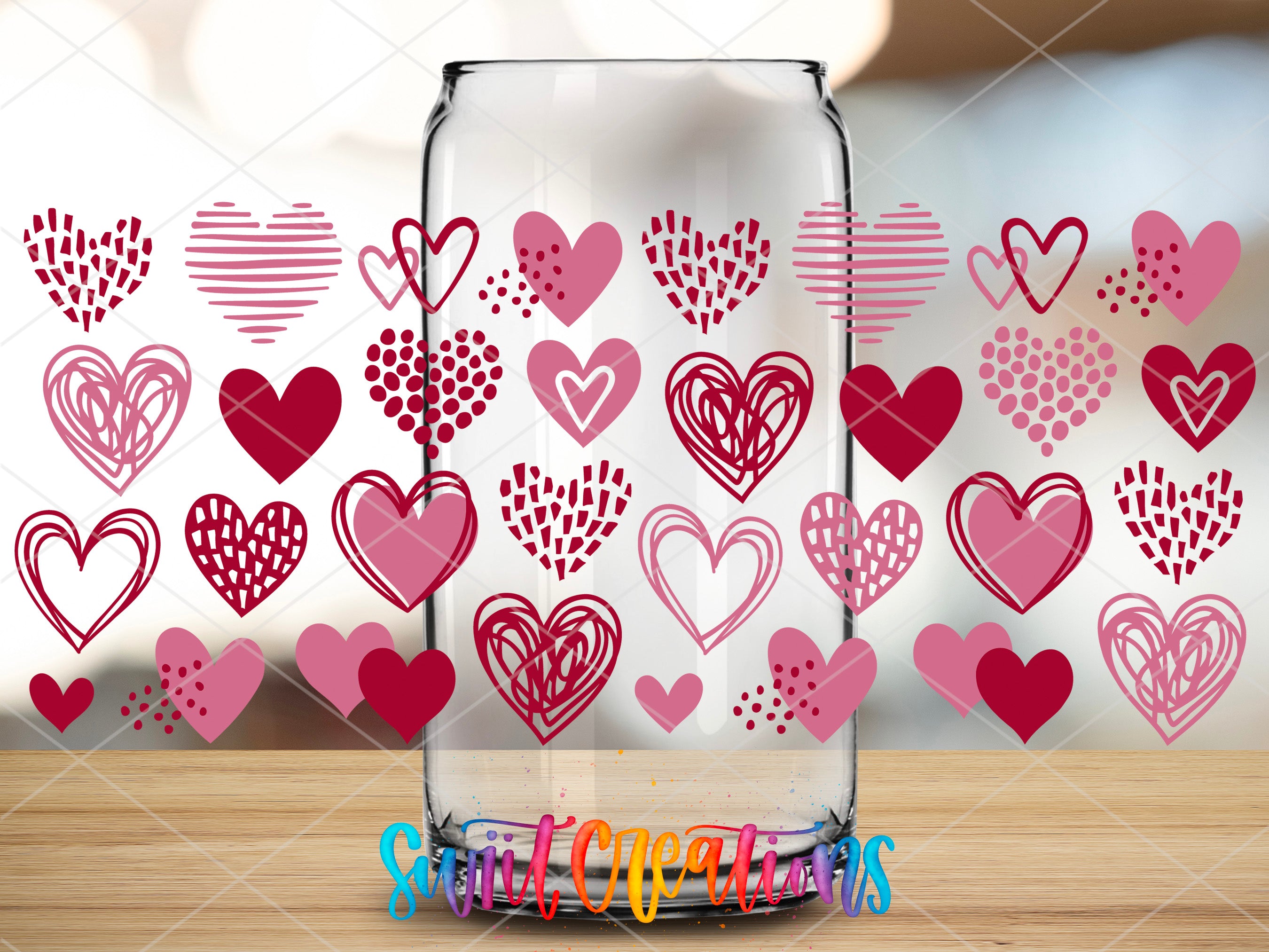 a glass jar with hearts drawn on it
