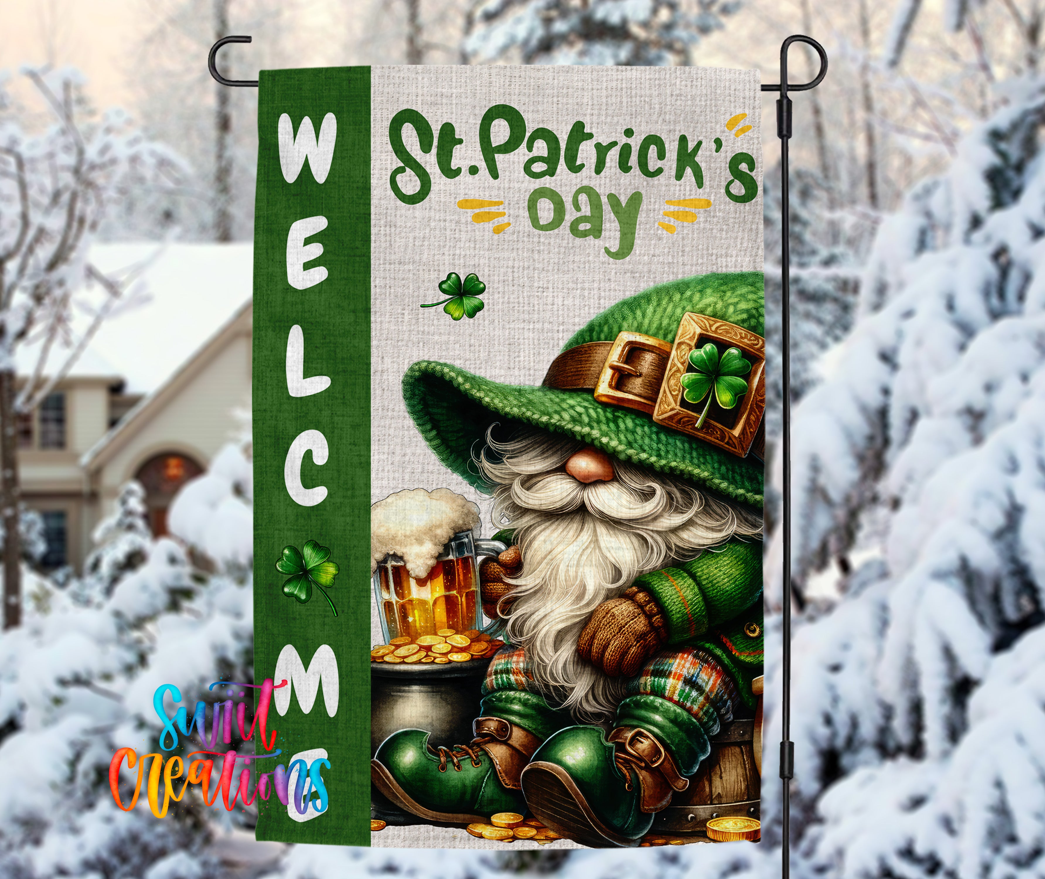 A colorful St. Patrick's Day-themed garden flag featuring a gnome wearing a green hat and holding a mug of beer, with a snowy background and a house in the distance.