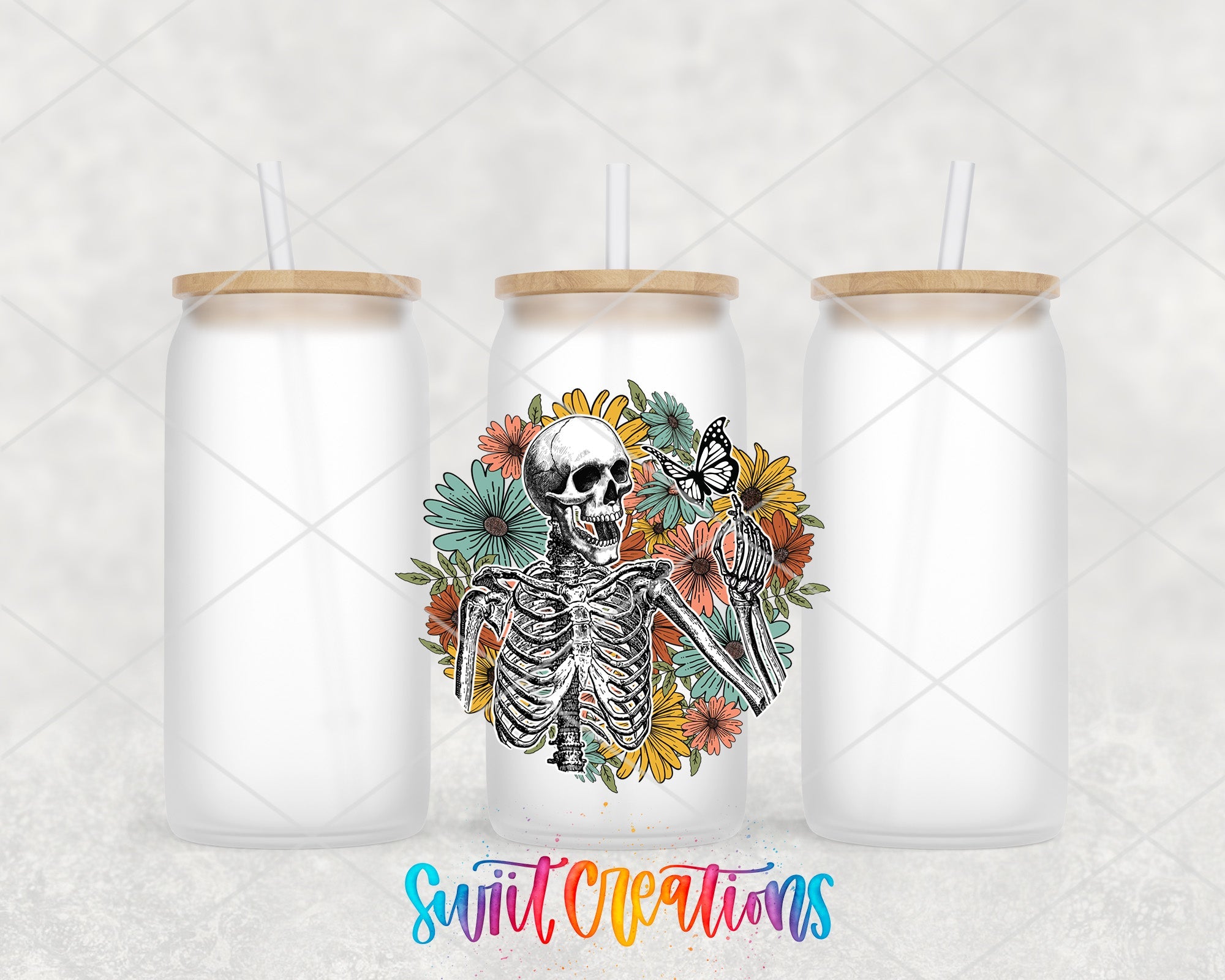 a couple of white mason jars with a skeleton on them