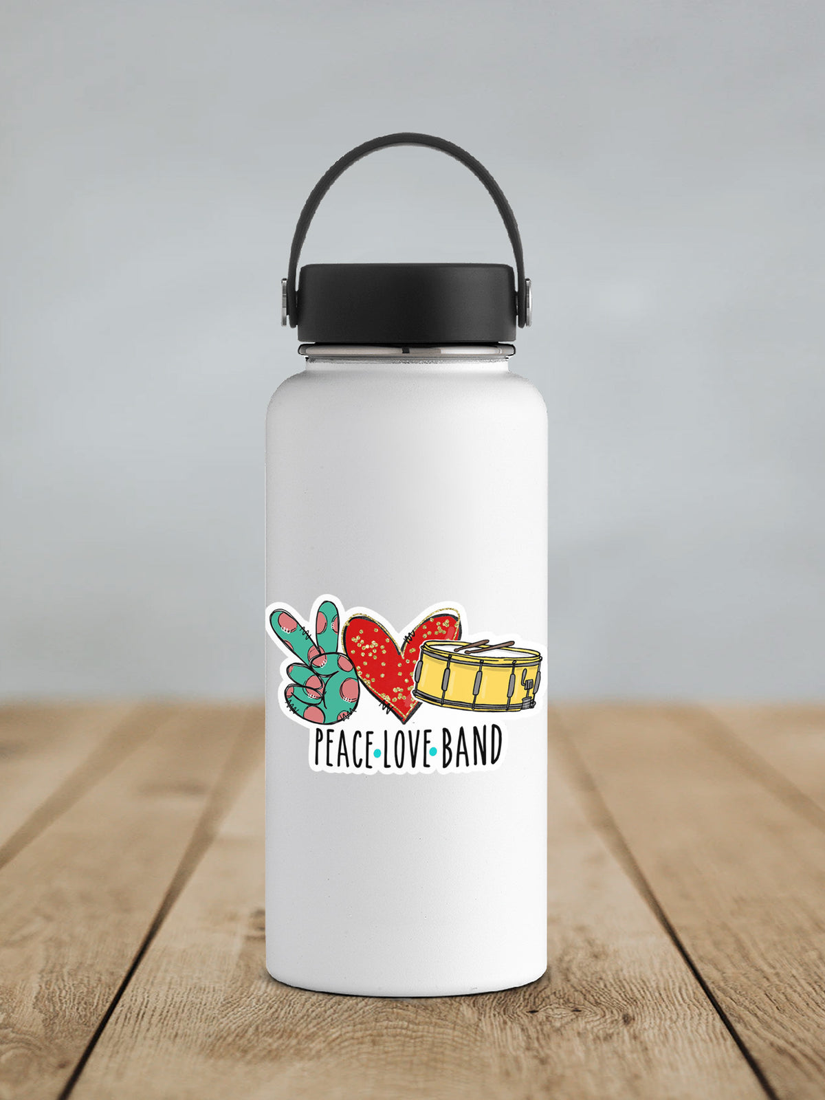 Peace Love Band sticker on a white insulated water bottle