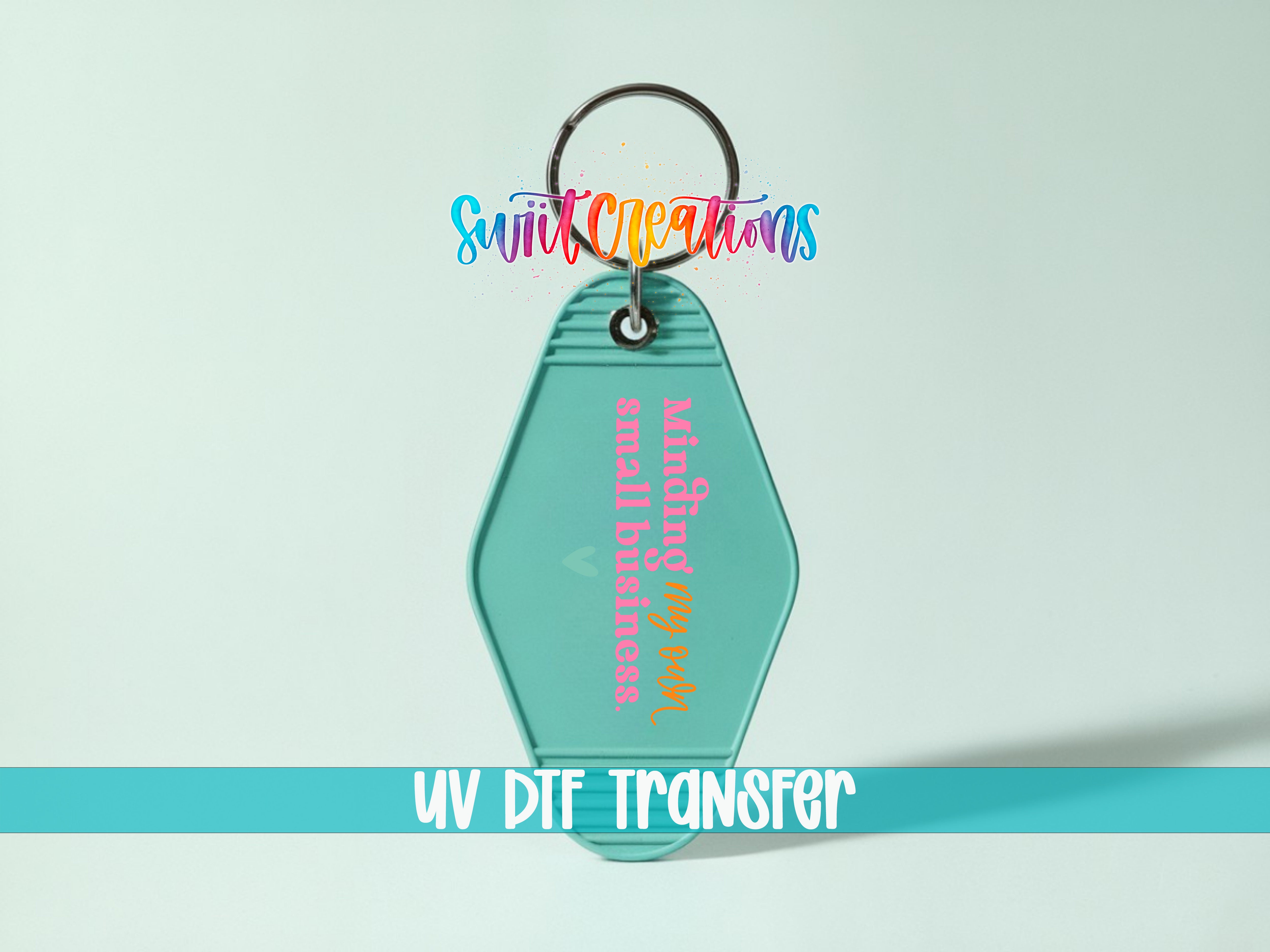 A keychain with a message printed on it, along with a UV DIF Transfer logo.