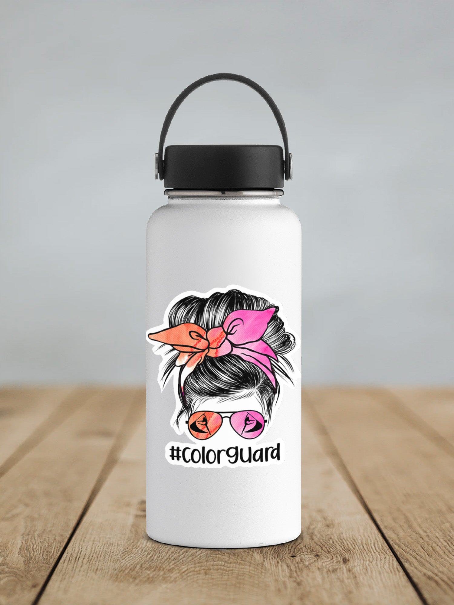 a water bottle with a picture of a woman's face on it