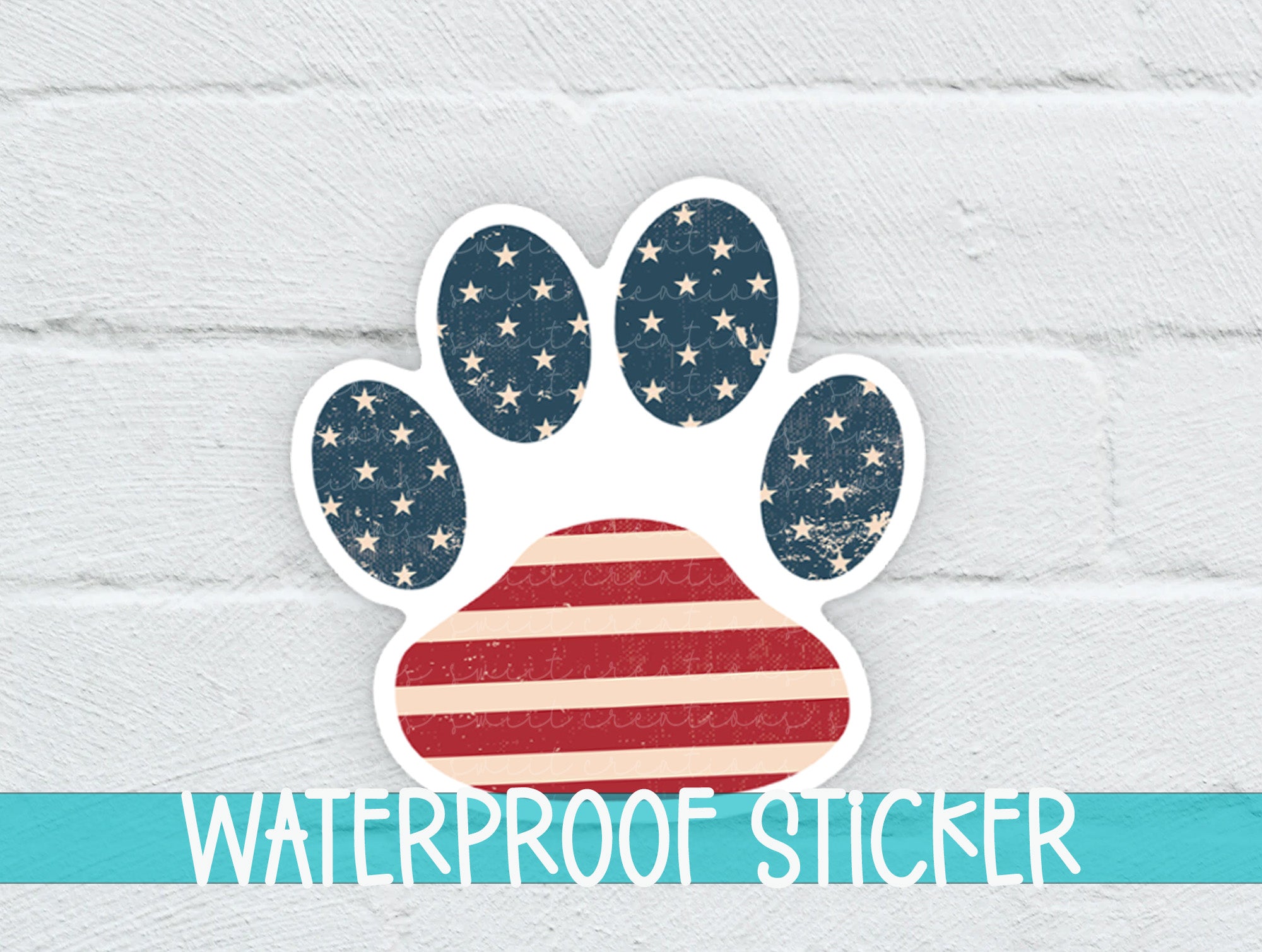 a sticker of a paw with the american flag on it