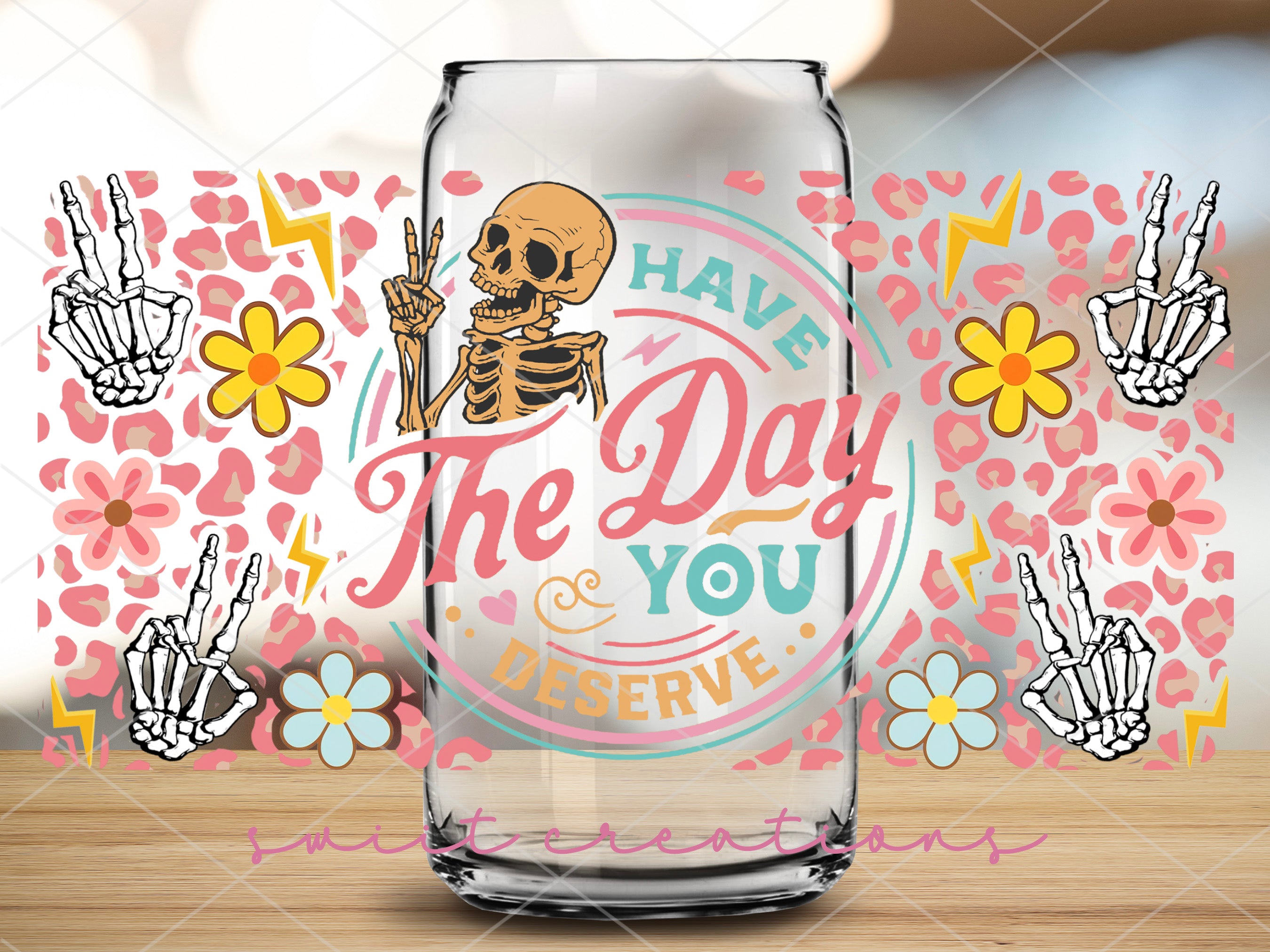 a glass with a picture of a skeleton on it