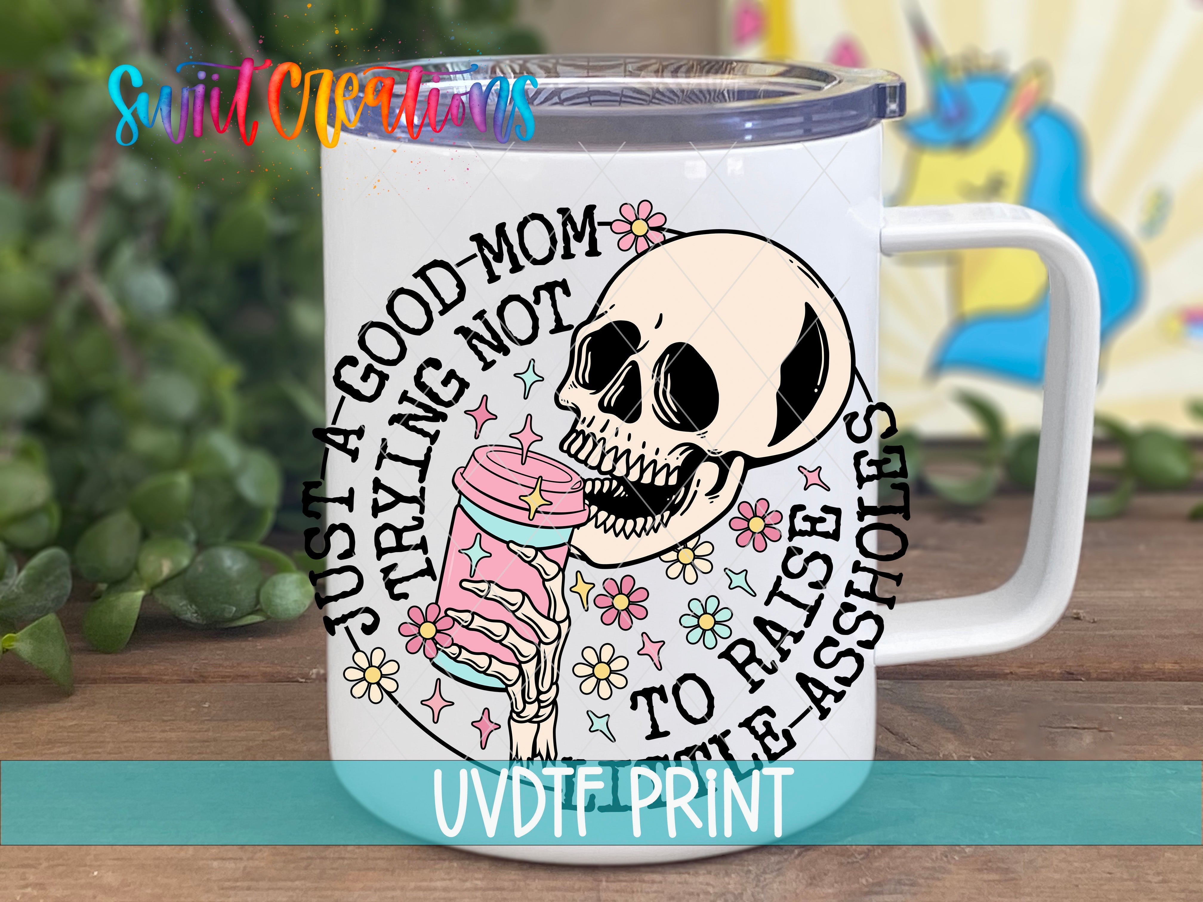 a white coffee mug with a skull on it