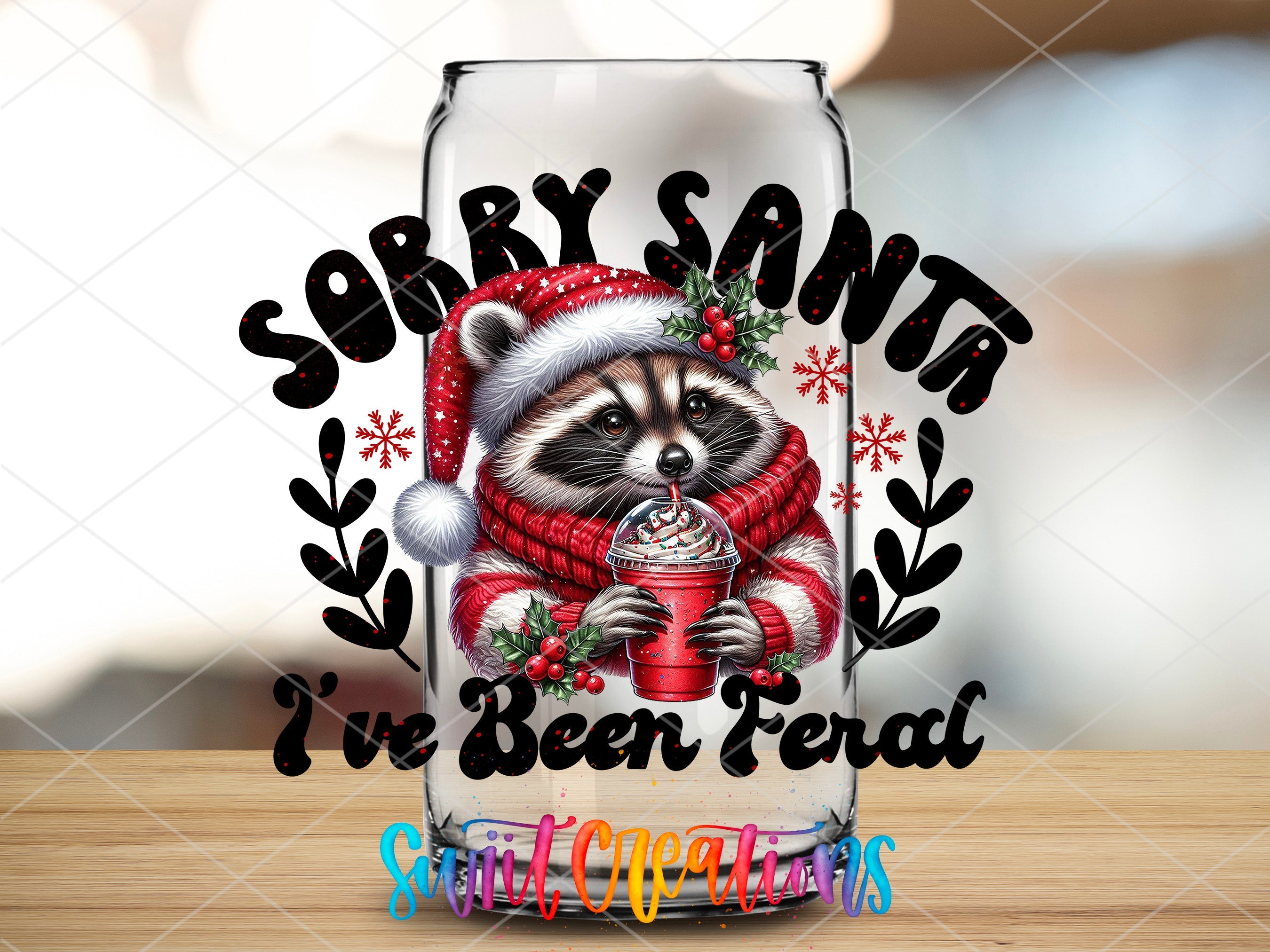 a glass with a raccoon wearing a santa hat and holding a cup