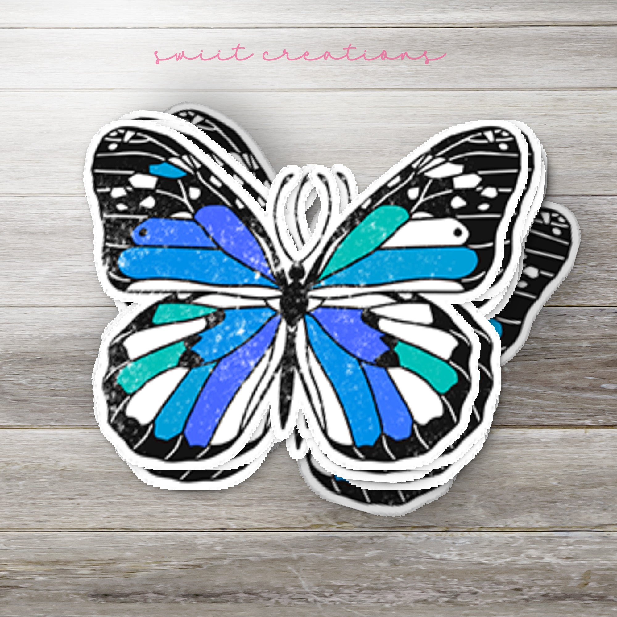 a sticker of a blue and black butterfly