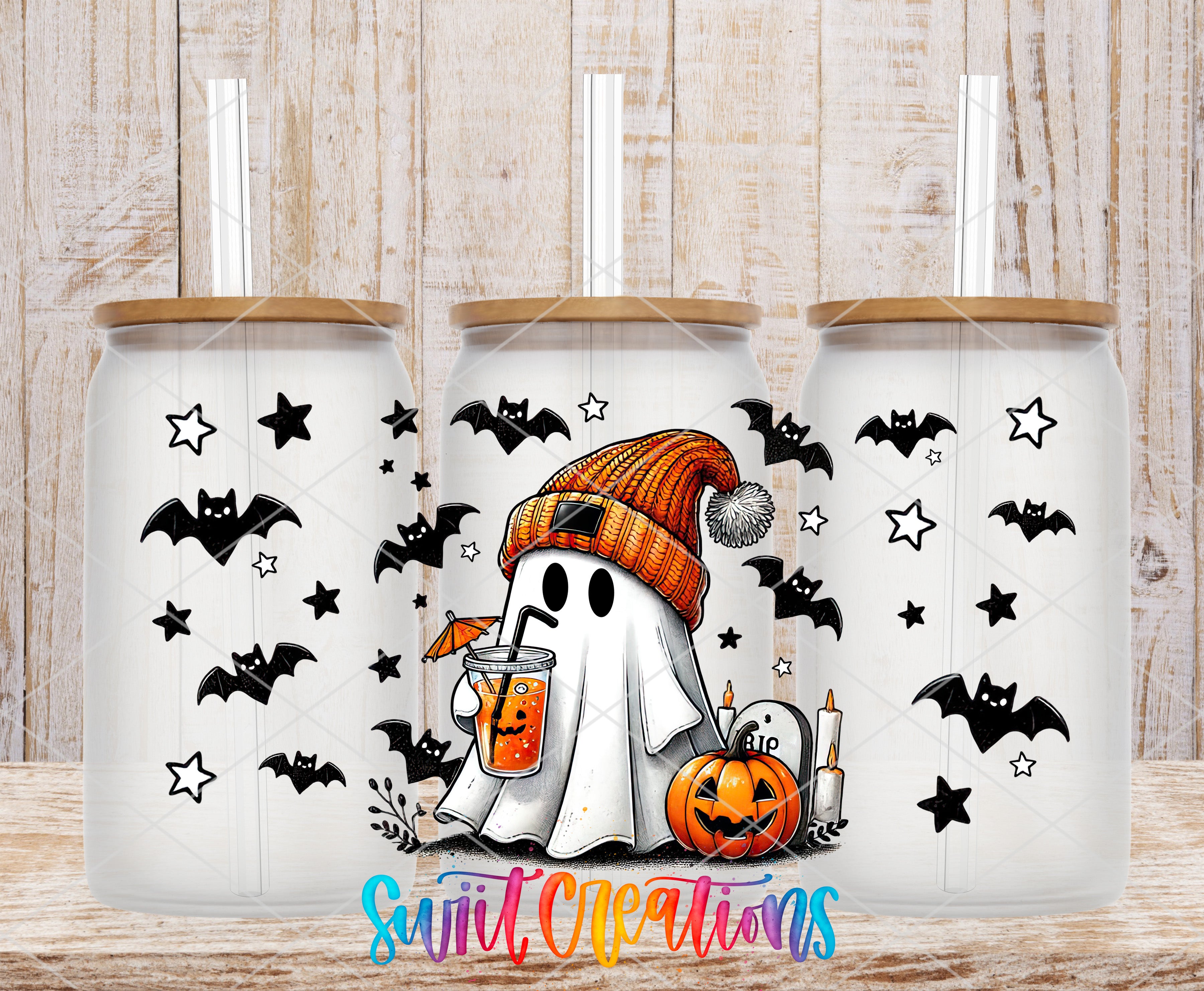 A Halloween-themed tumbler with a ghost wearing a striped hat and holding a drink, surrounded by bats and pumpkins.